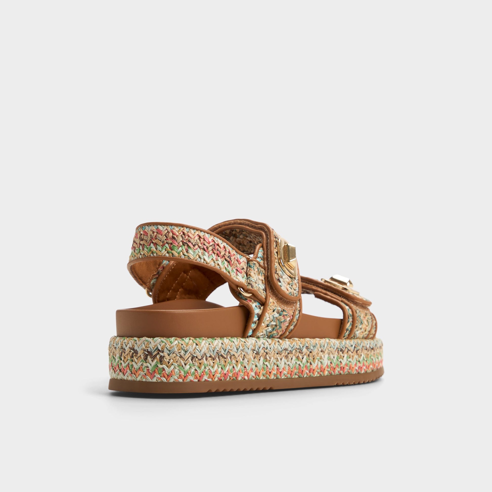 Three-quarter angle of Bright Multi Sunhaven Footbed sandal's back side
