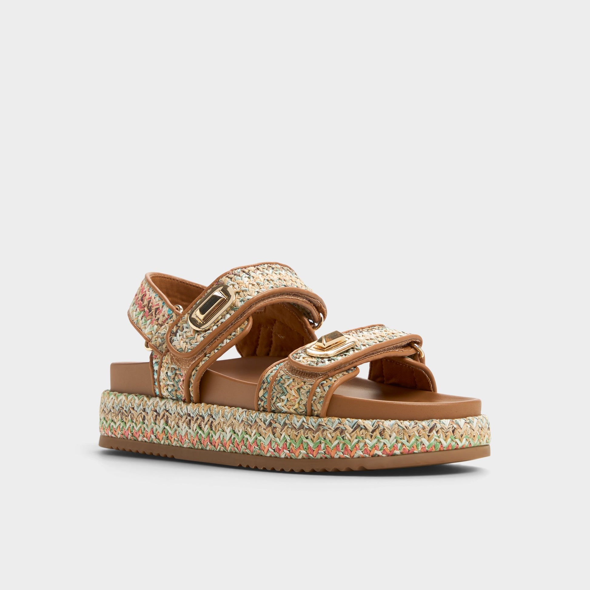 Three-quarter angle of Bright Multi Sunhaven Footbed sandal's front side