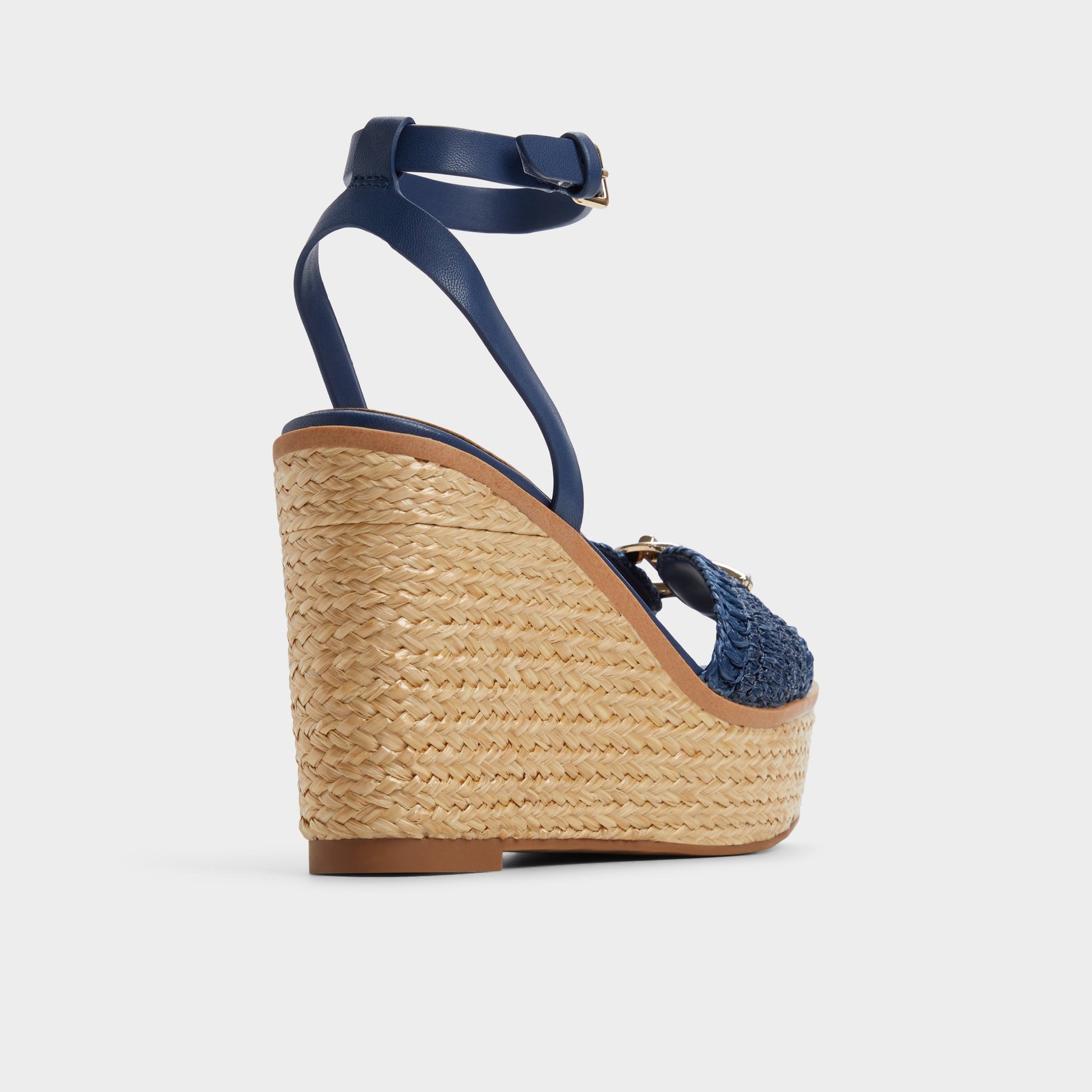 Three-quarter angle of Navy Ybylin Wedge sandal's back side