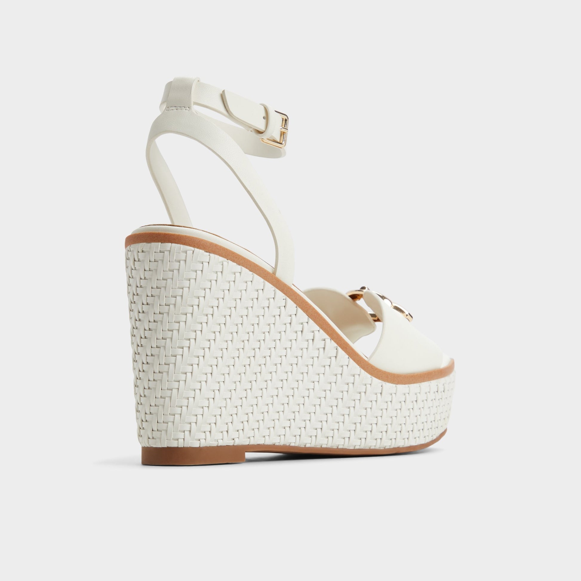 Three-quarter angle of White Ybylin Wedge sandal's back side