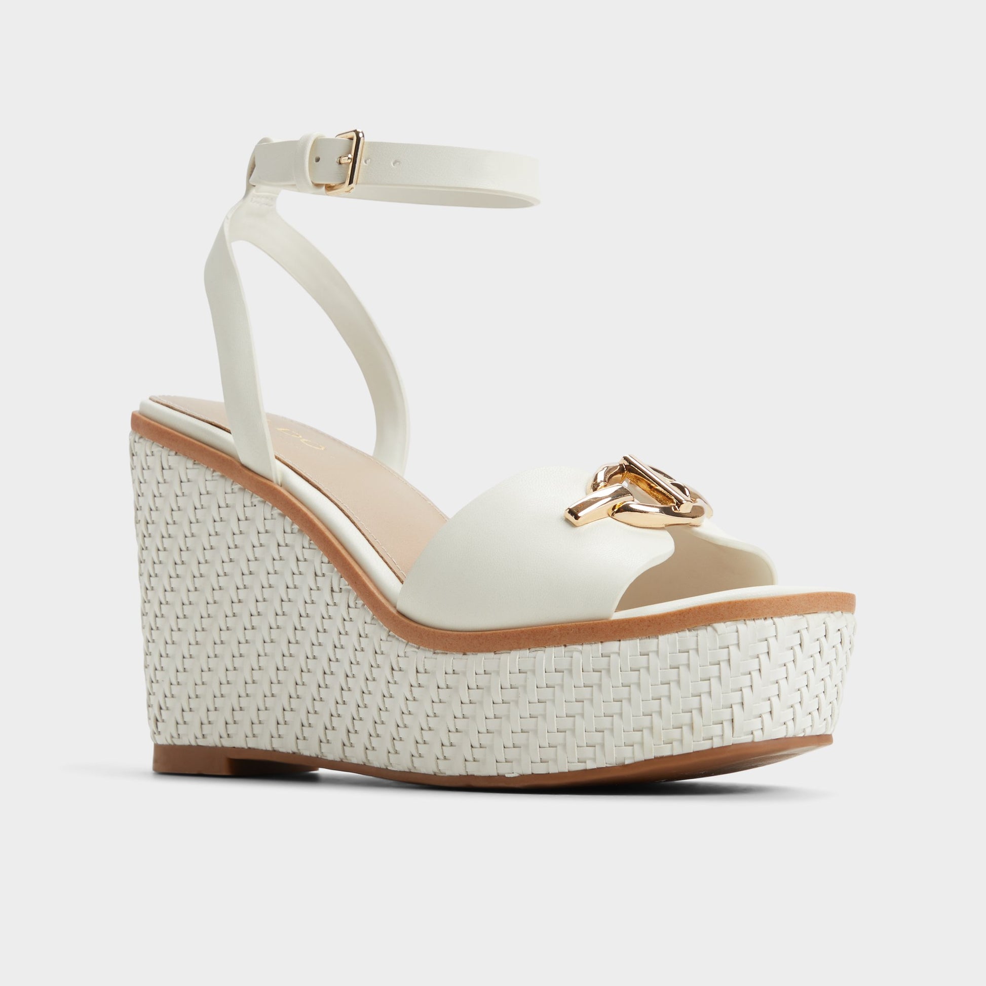 Three-quarter angle of White Ybylin Wedge sandal's front side