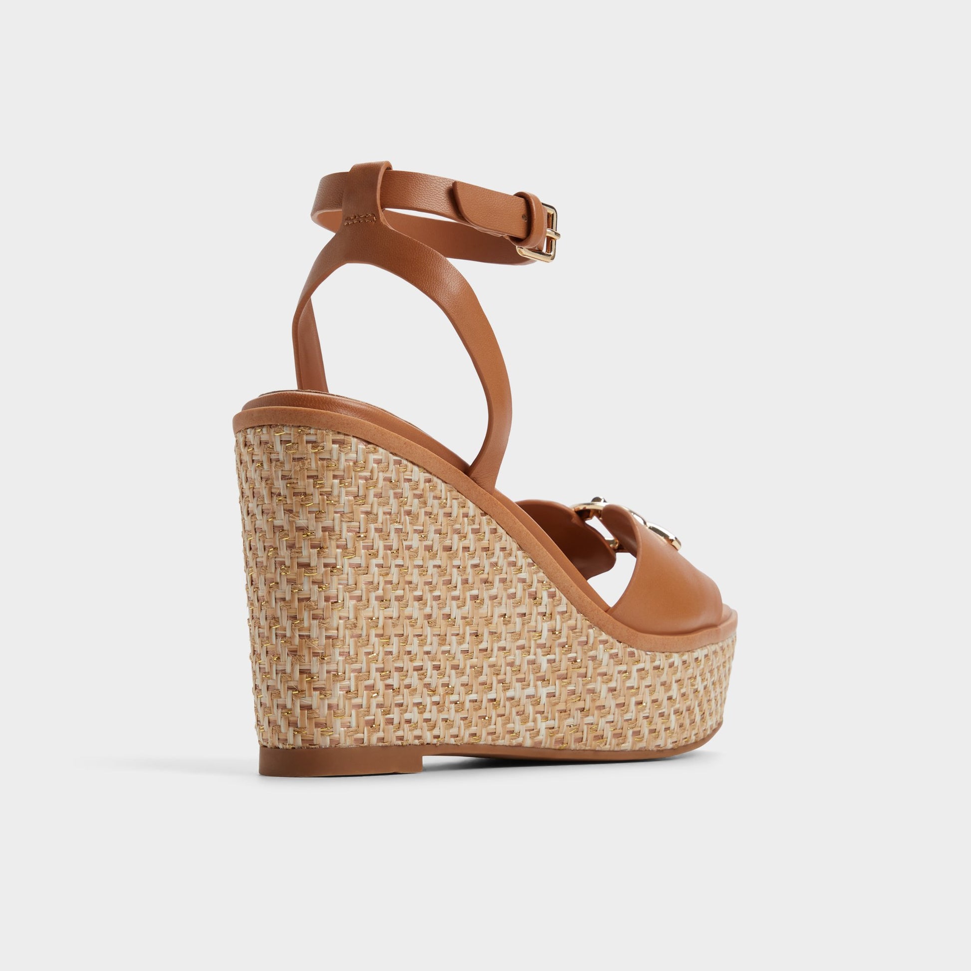 Three-quarter angle of Medium Brown Ybylin Wedge sandal's back side