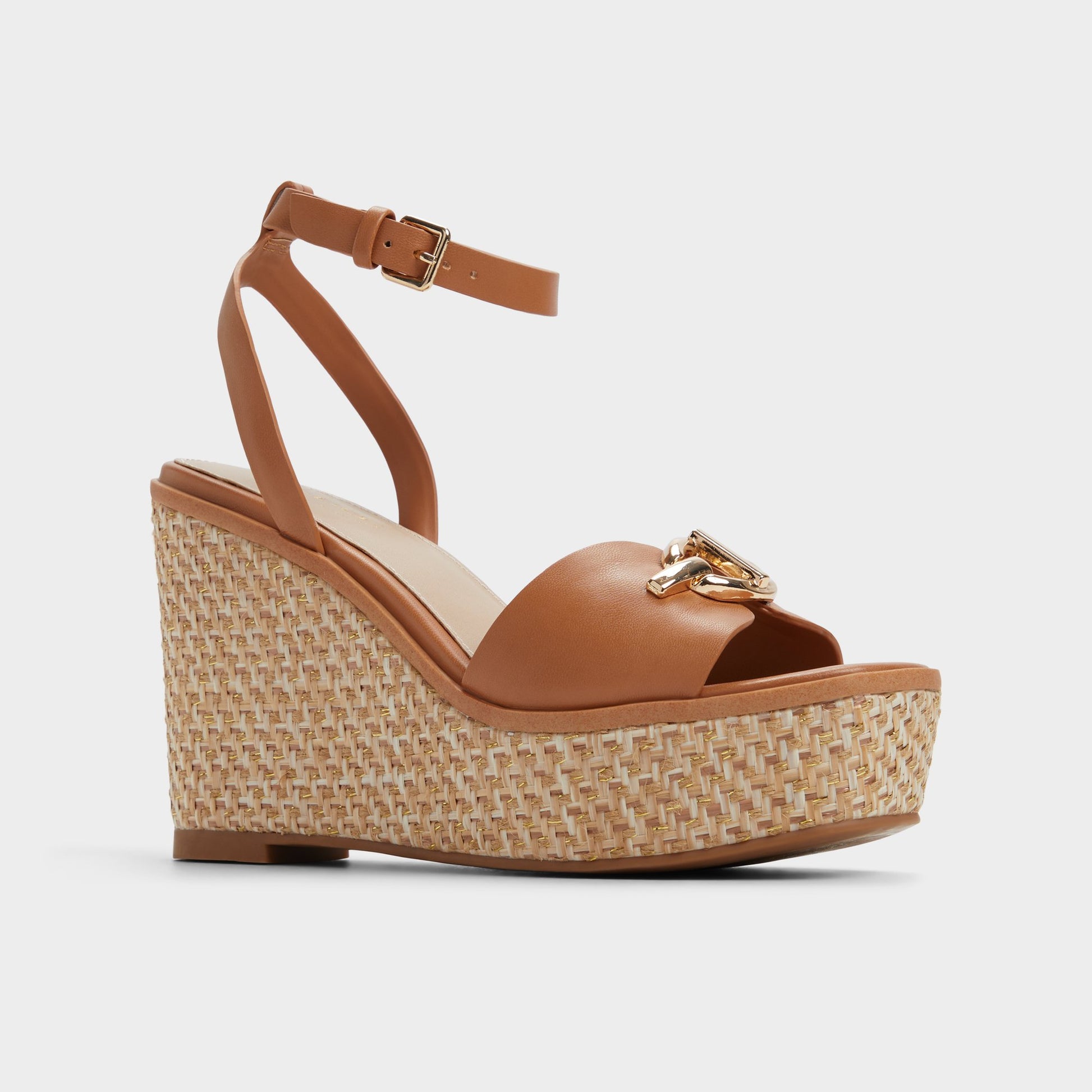 Three-quarter angle of Medium Brown Ybylin Wedge sandal's front side