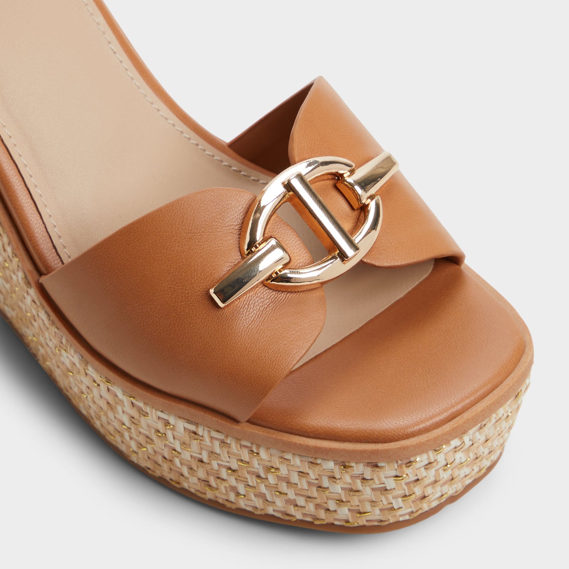 Close-up of the Medium Brown Ybylin Wedge sandal