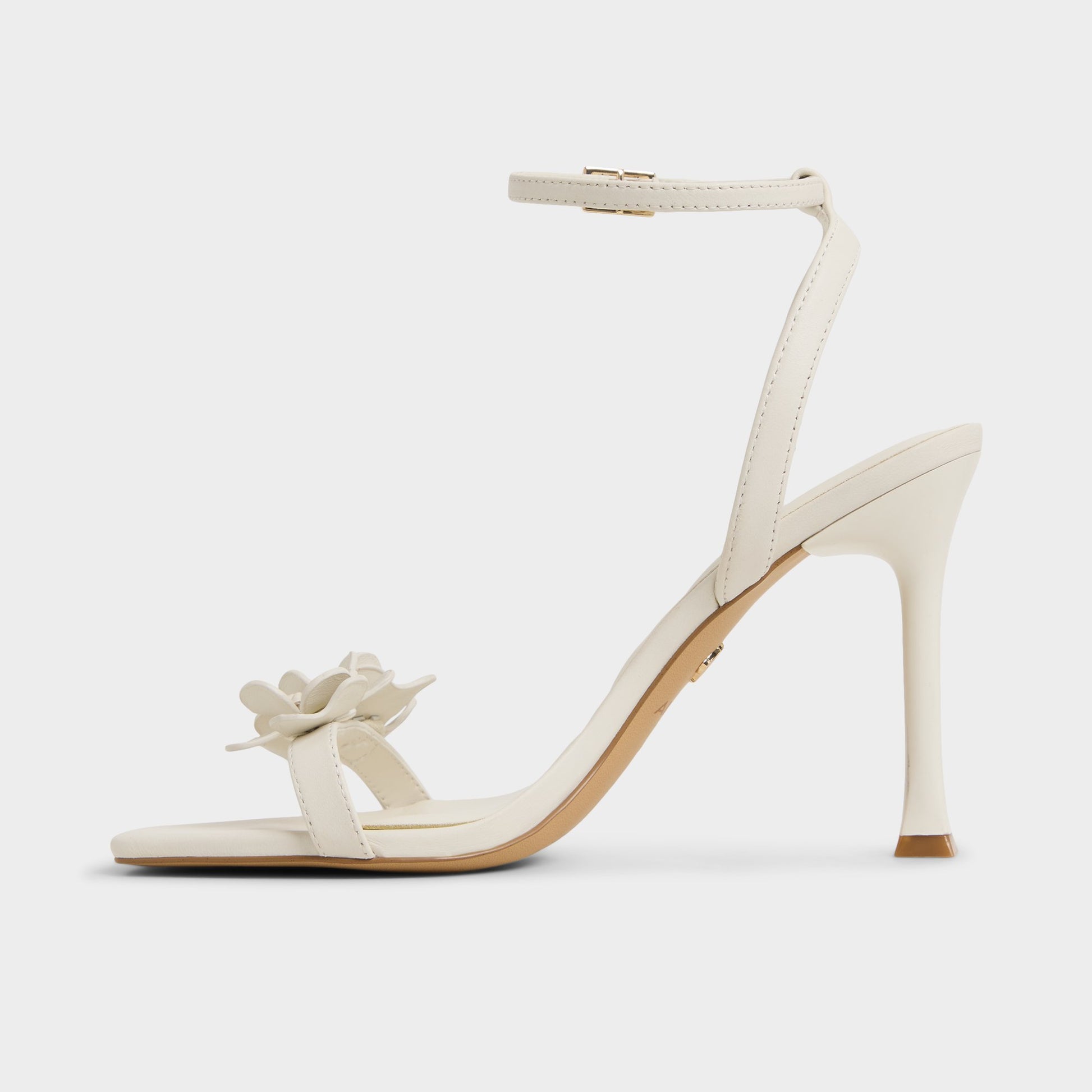 Side view of White/Bone Daisylily Strappy heeled sandal