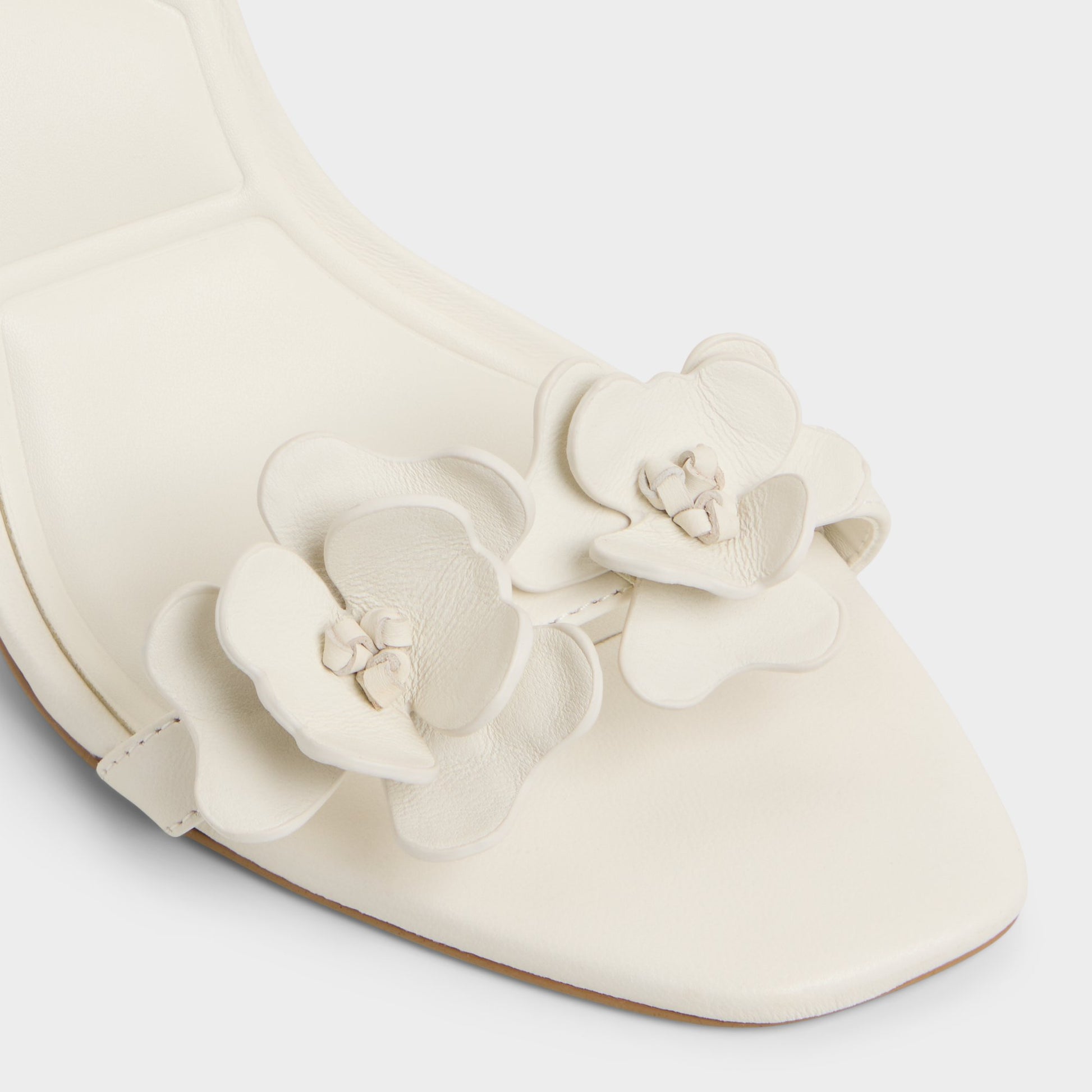 Close-up of the White/Bone Daisylily Strappy heeled sandal