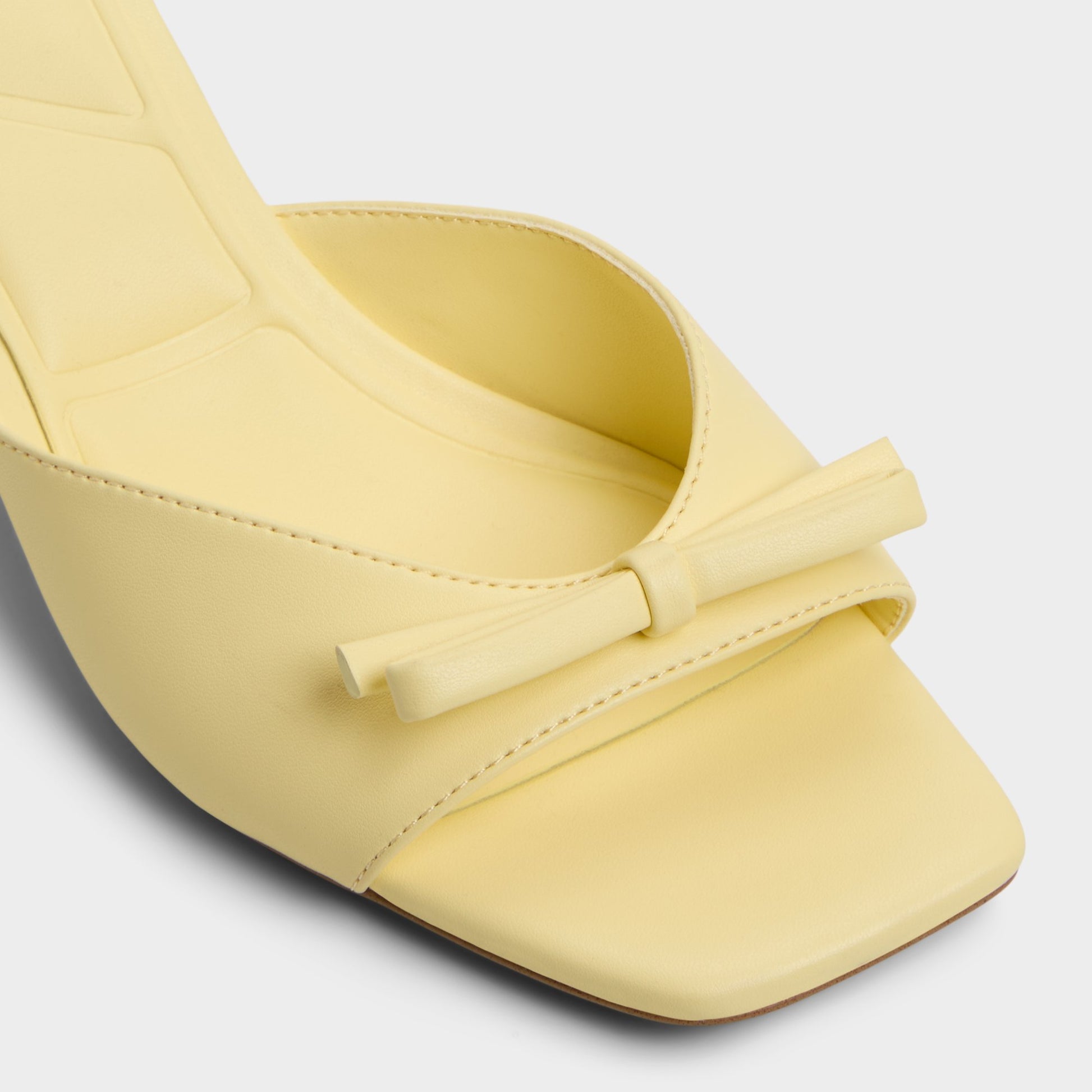 Close-up of the Light Yellow Belerose Heeled mule