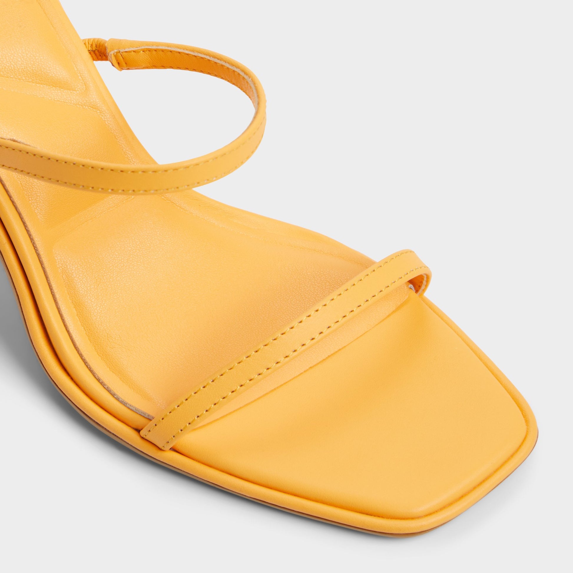 Close-up of the Medium Orange Calalden Strappy heeled sandal