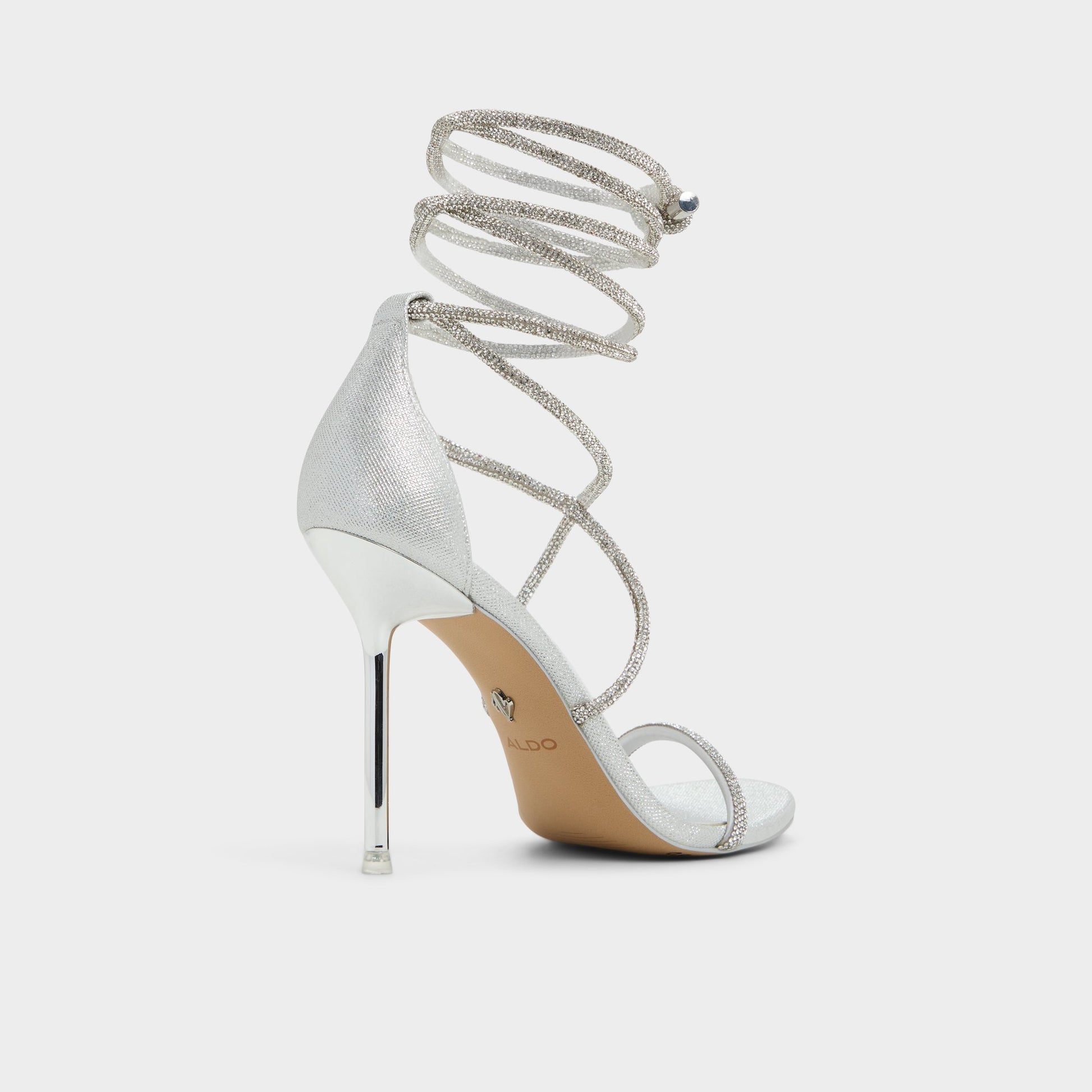 Three-quarter angle of Silver Caladonia Strappy heeled sandal's back side