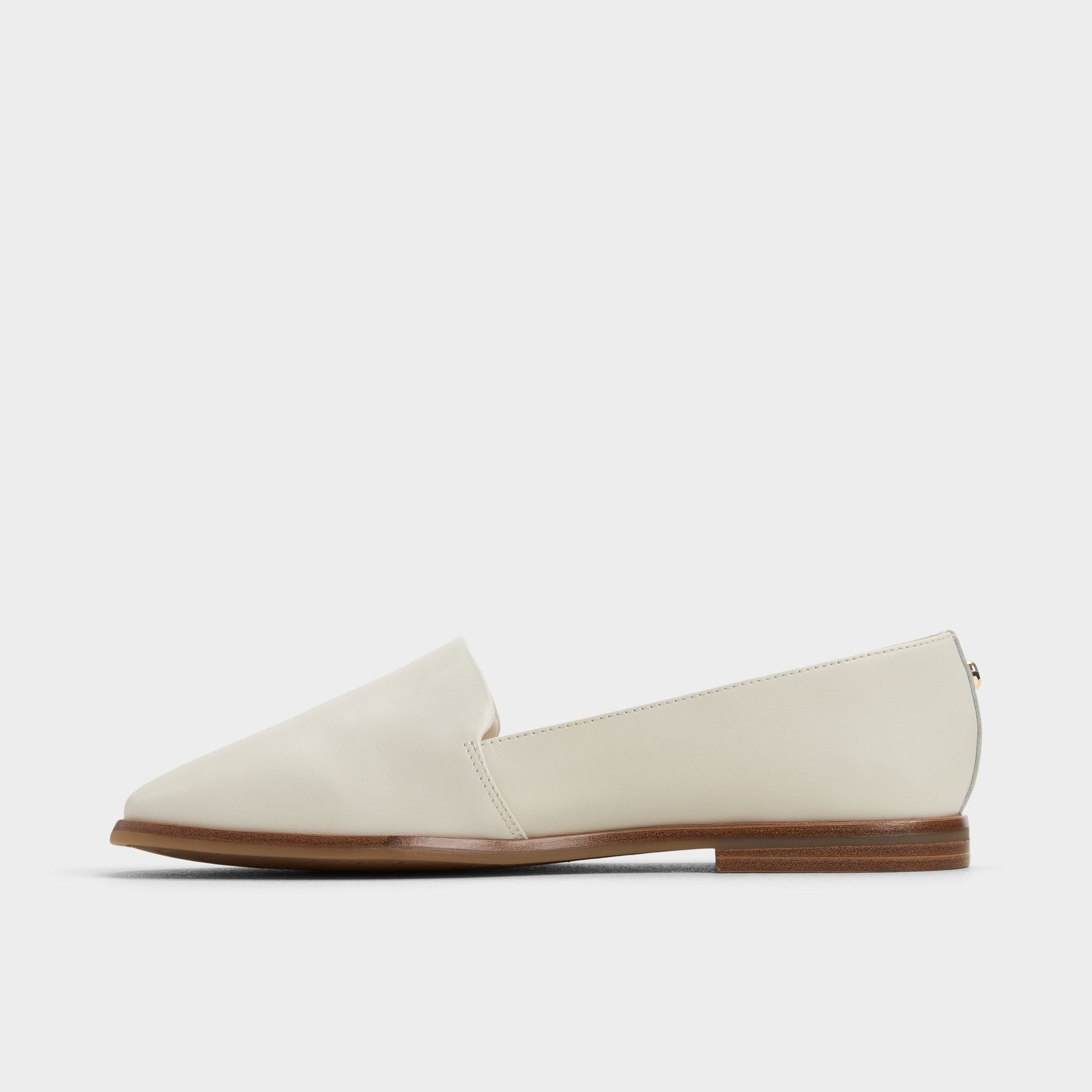 Side view of White/Bone Caraelia Slip-on