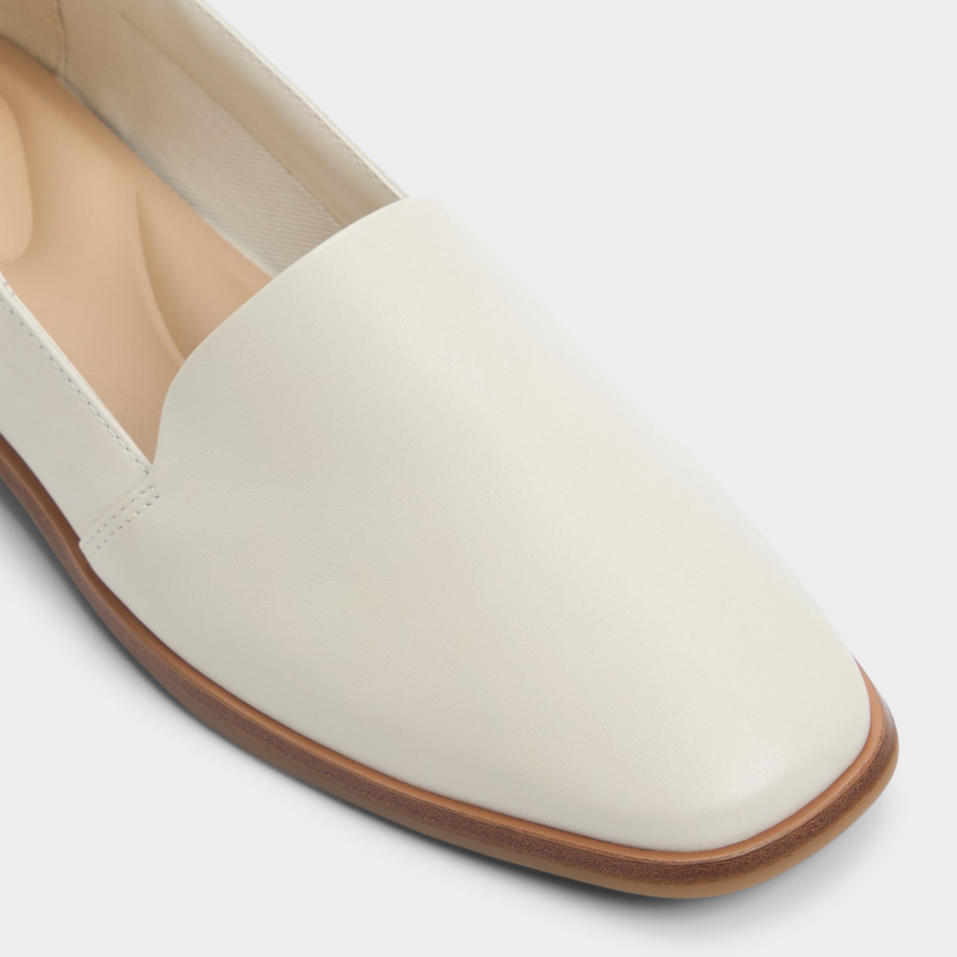 Close-up of the White/Bone Caraelia Slip-on