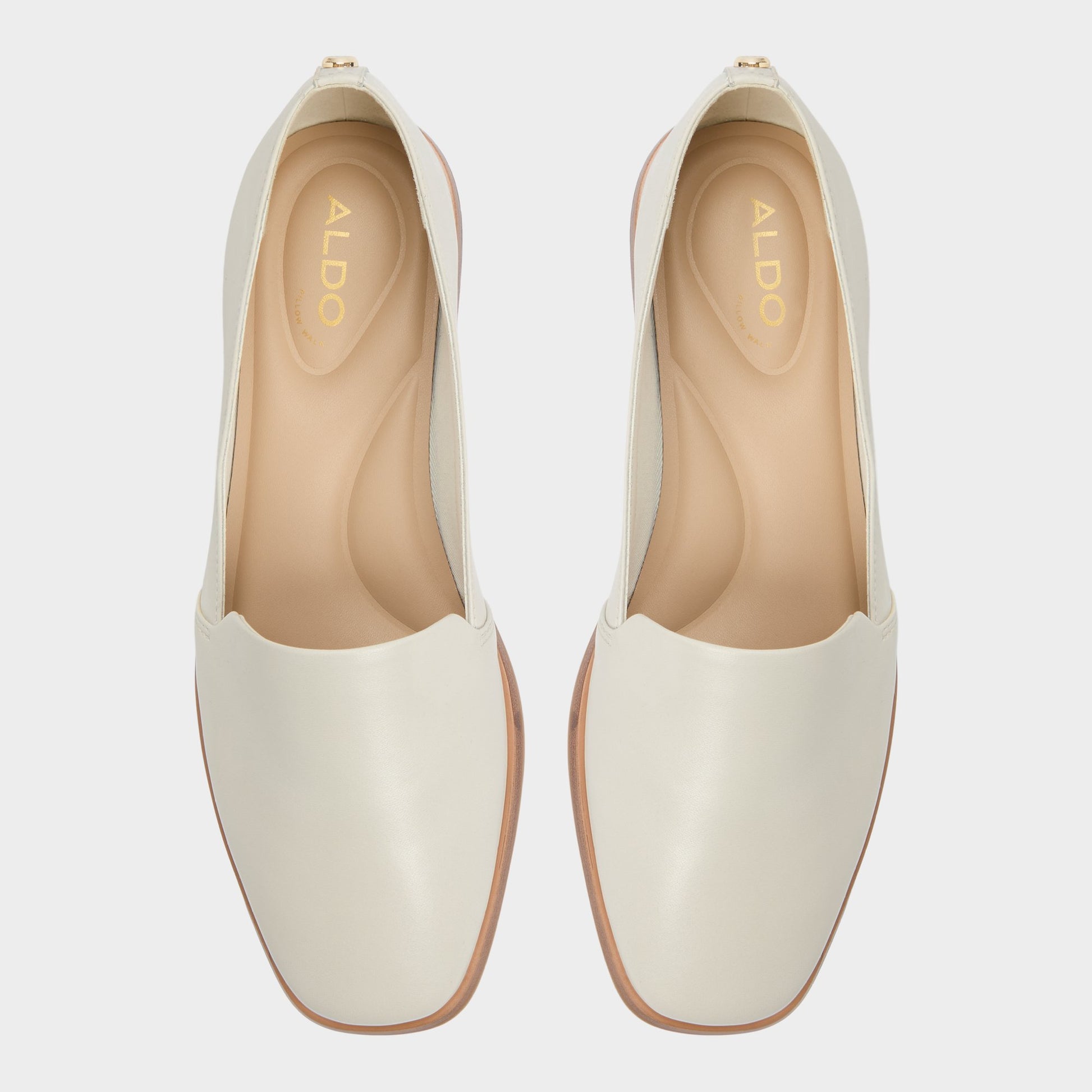 Top-down view of the White/Bone Caraelia Slip-on