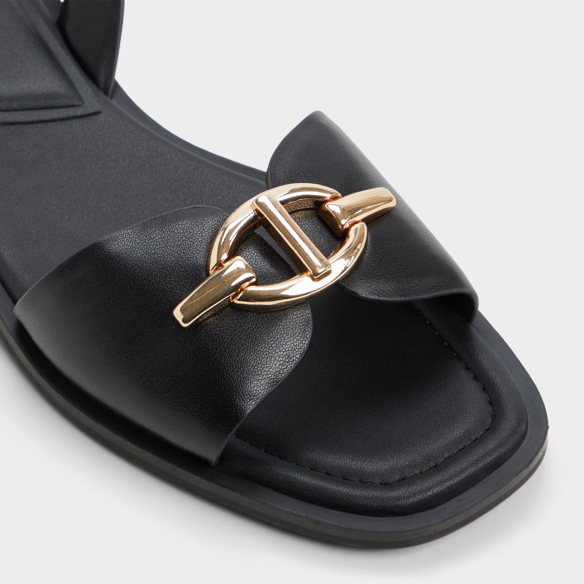 Close-up of the Black Goassi Flat sandal