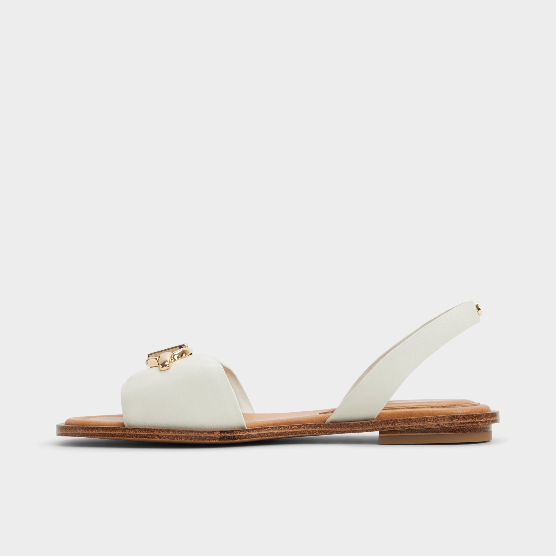 Side view of White/bone Goassi Flat sandal
