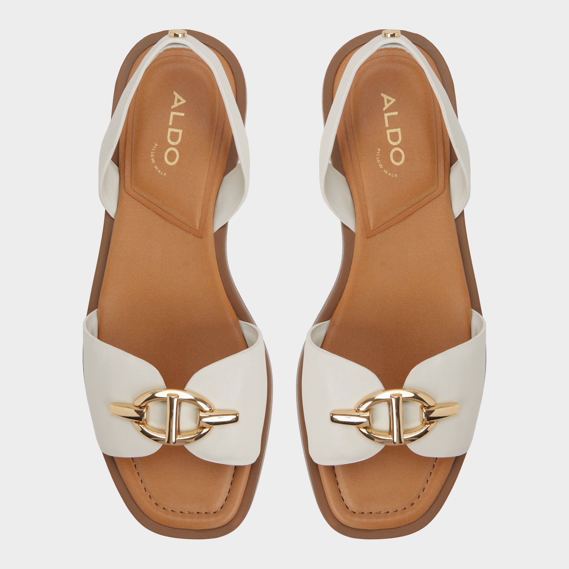 Top-down view of the White/bone Goassi Flat sandal
