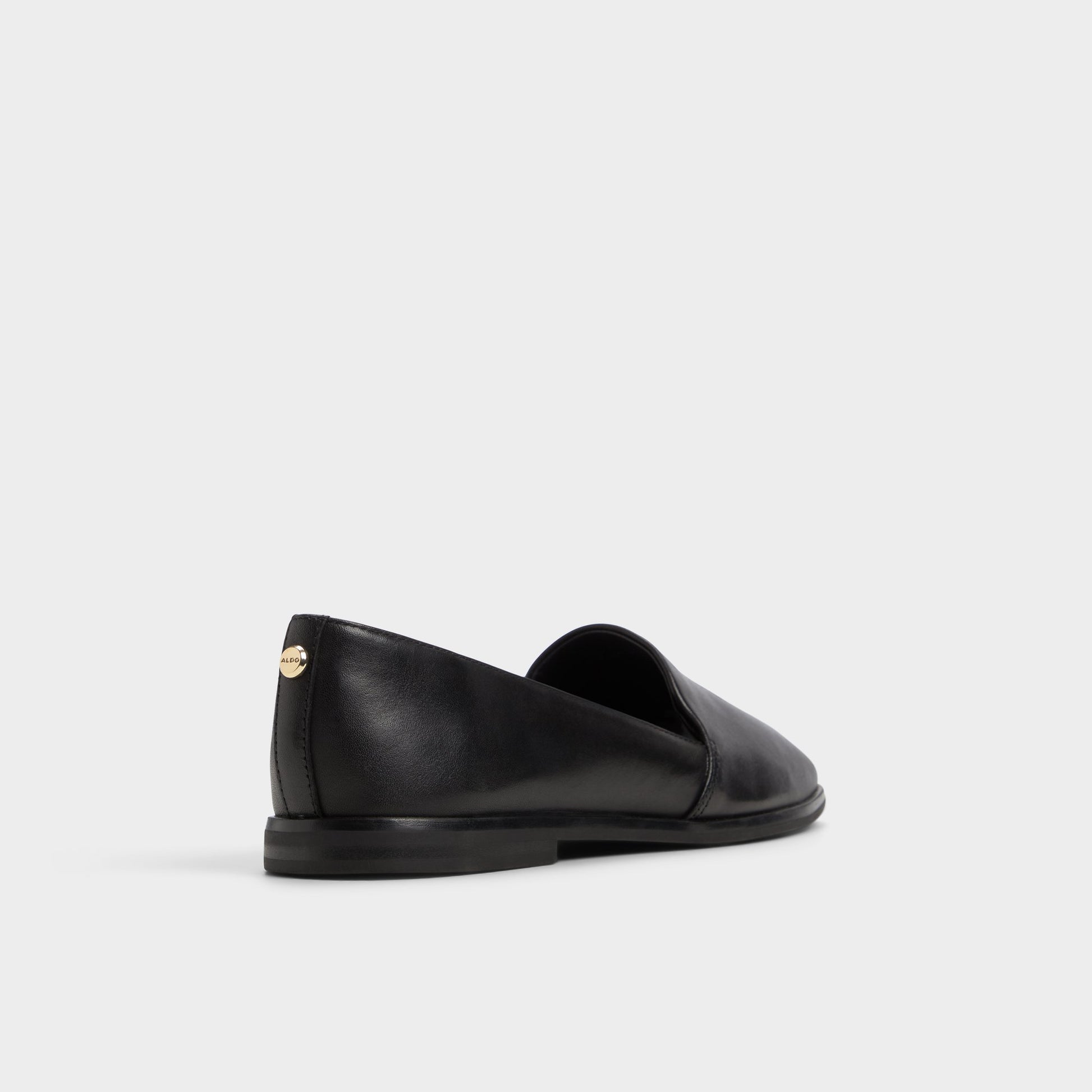 Three-quarter angle of Black Caraelia Slip-on's back side