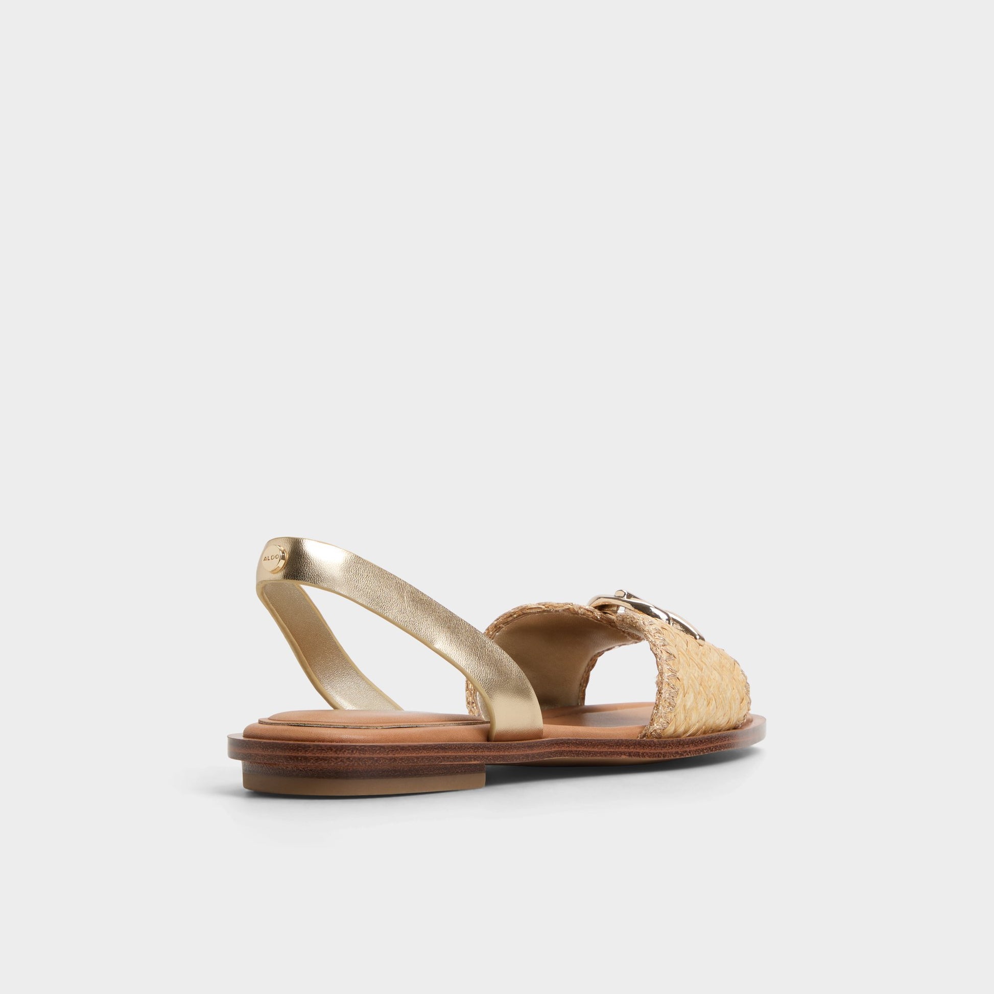 Three-quarter angle of Gold Goassi Flat sandal's back side