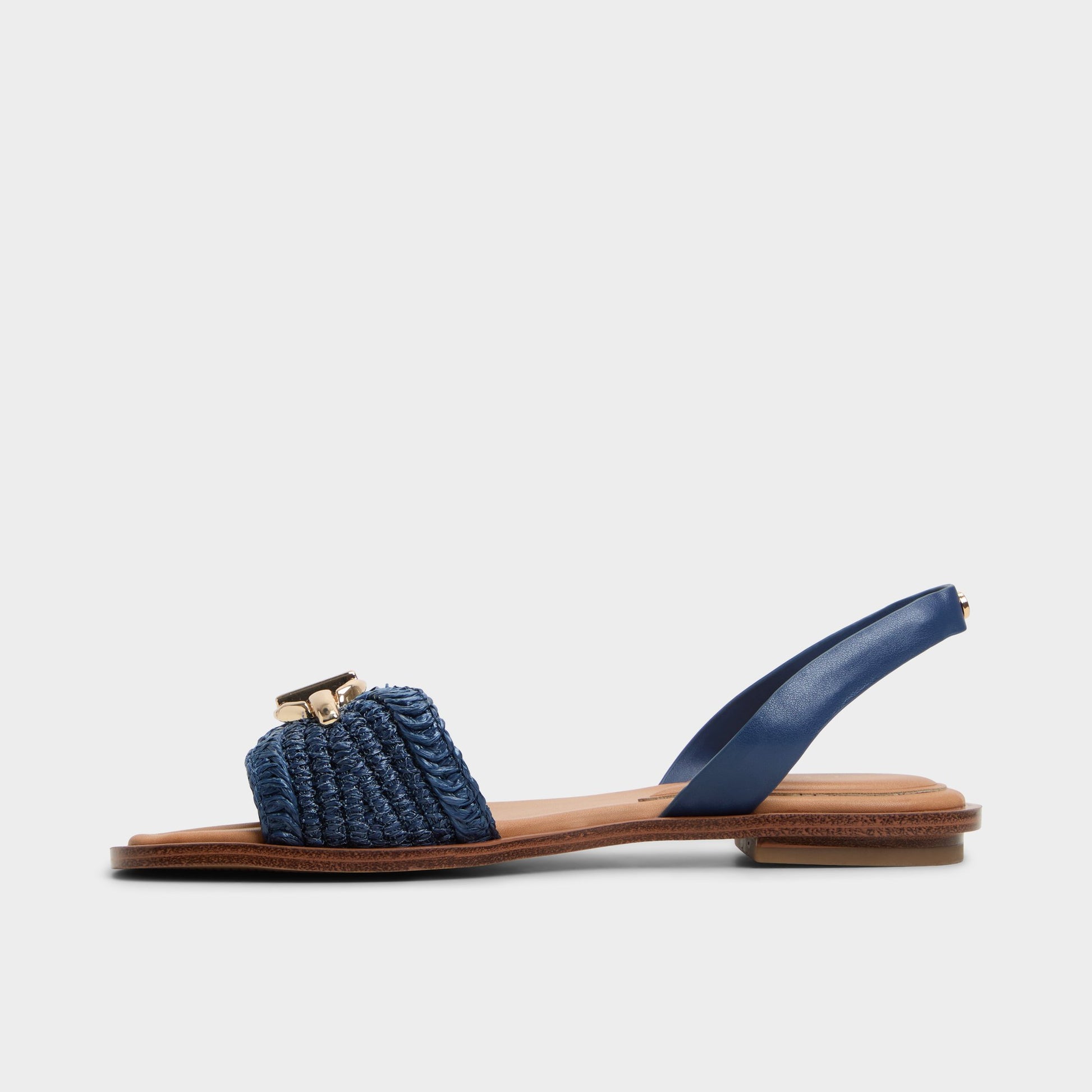 Side view of Navy Goassi Flat sandal