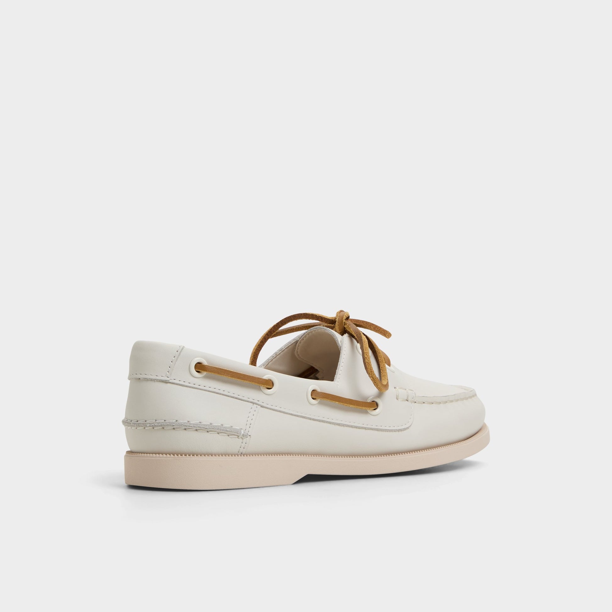 Three-quarter angle of White/Bone Harborchic Boat shoe's back side