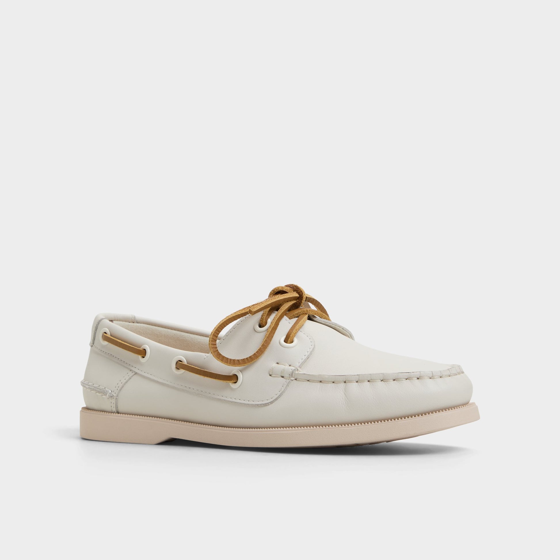 Three-quarter angle of White/Bone Harborchic Boat shoe's front side