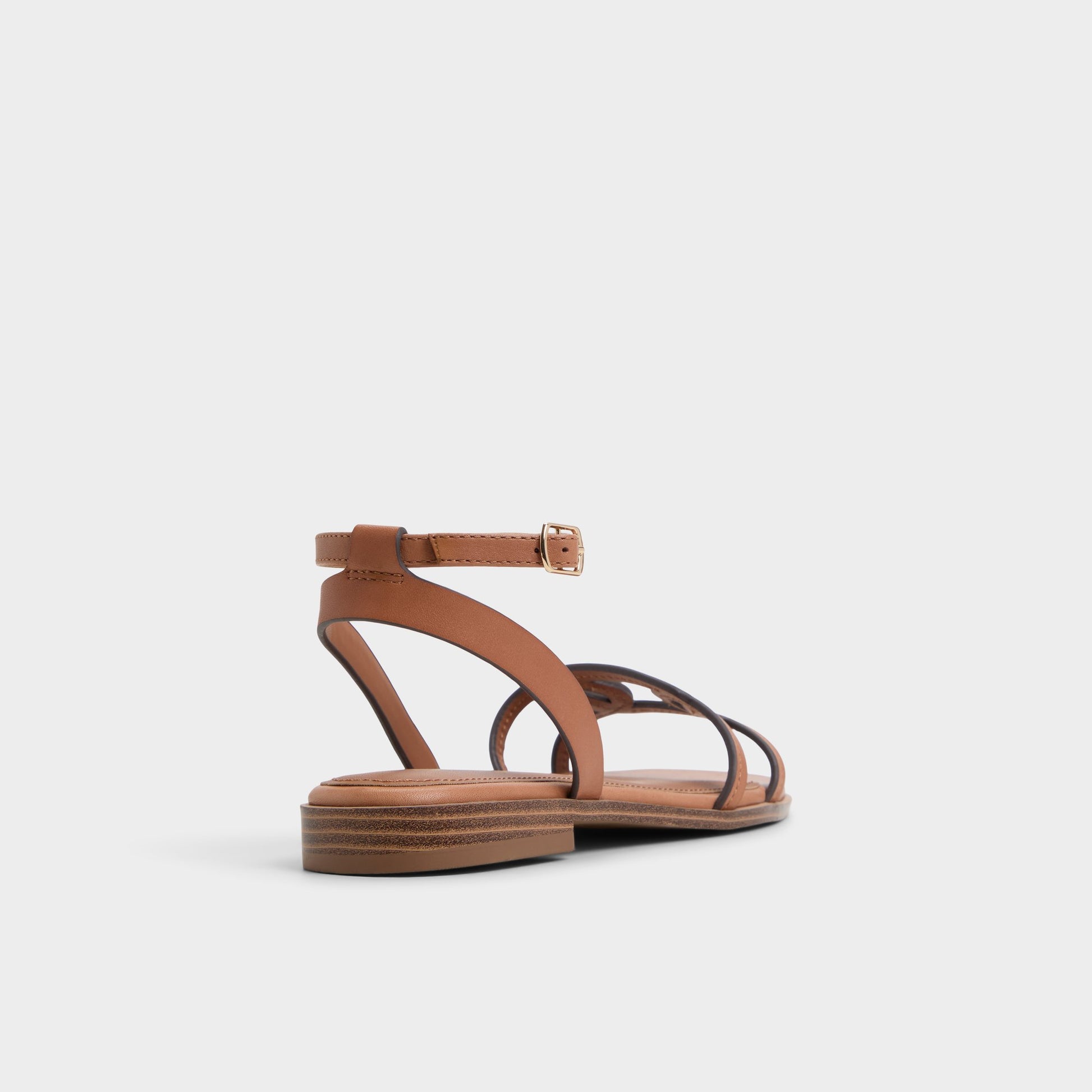 Three-quarter angle of Medium Brown Greengrove Flat sandal's back side