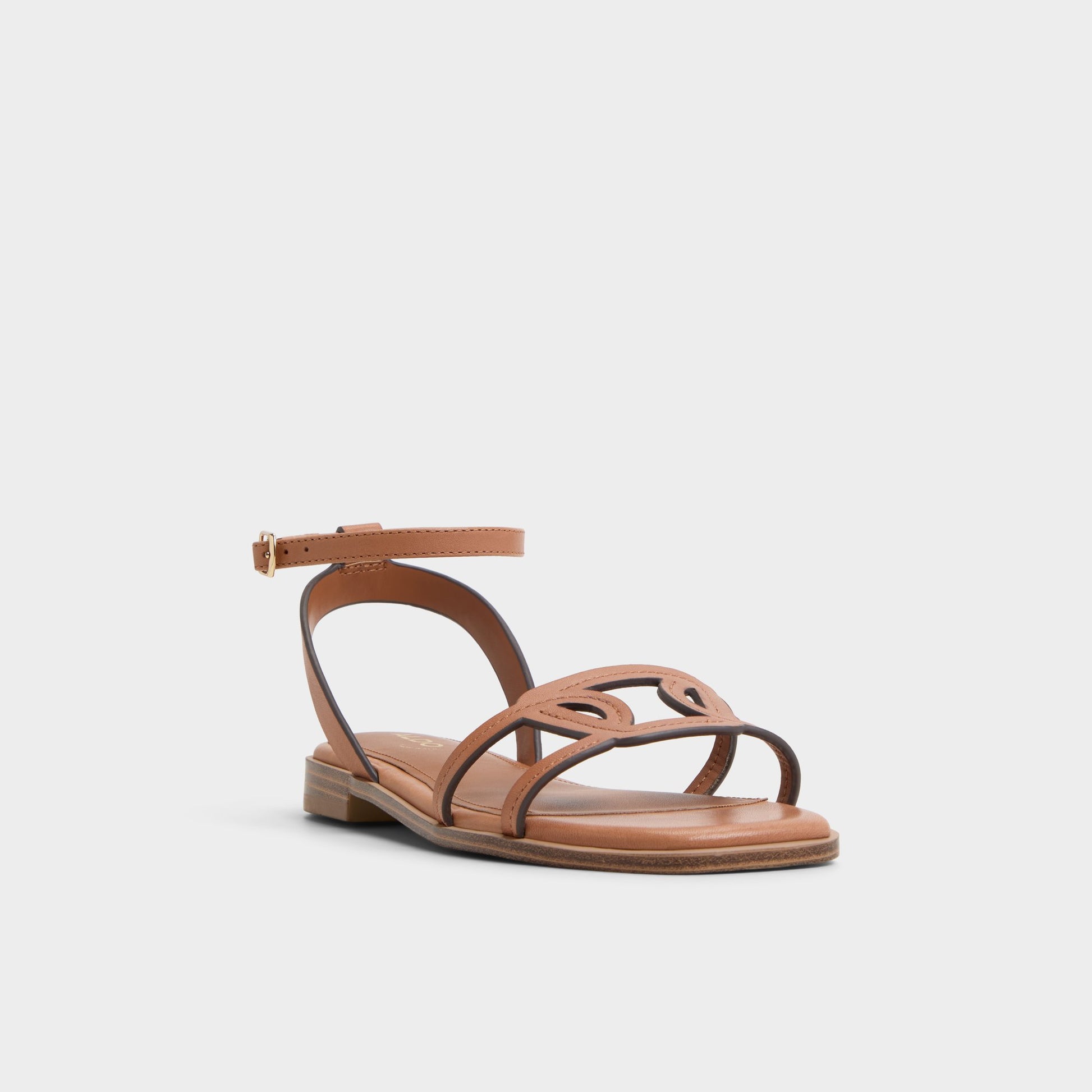 Three-quarter angle of Medium Brown Greengrove Flat sandal's front side