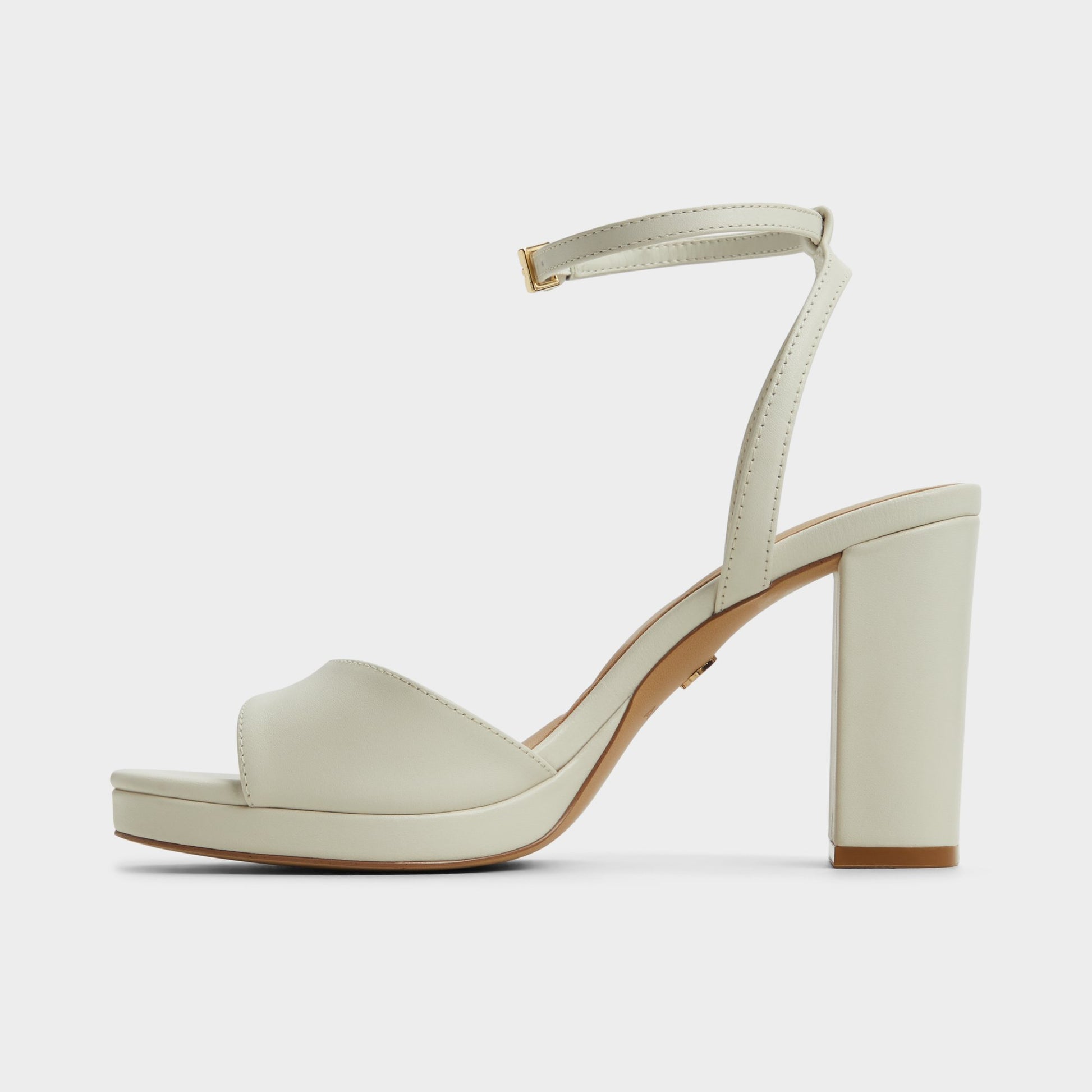Side view of White/Bone Gracious Strappy heeled sandal