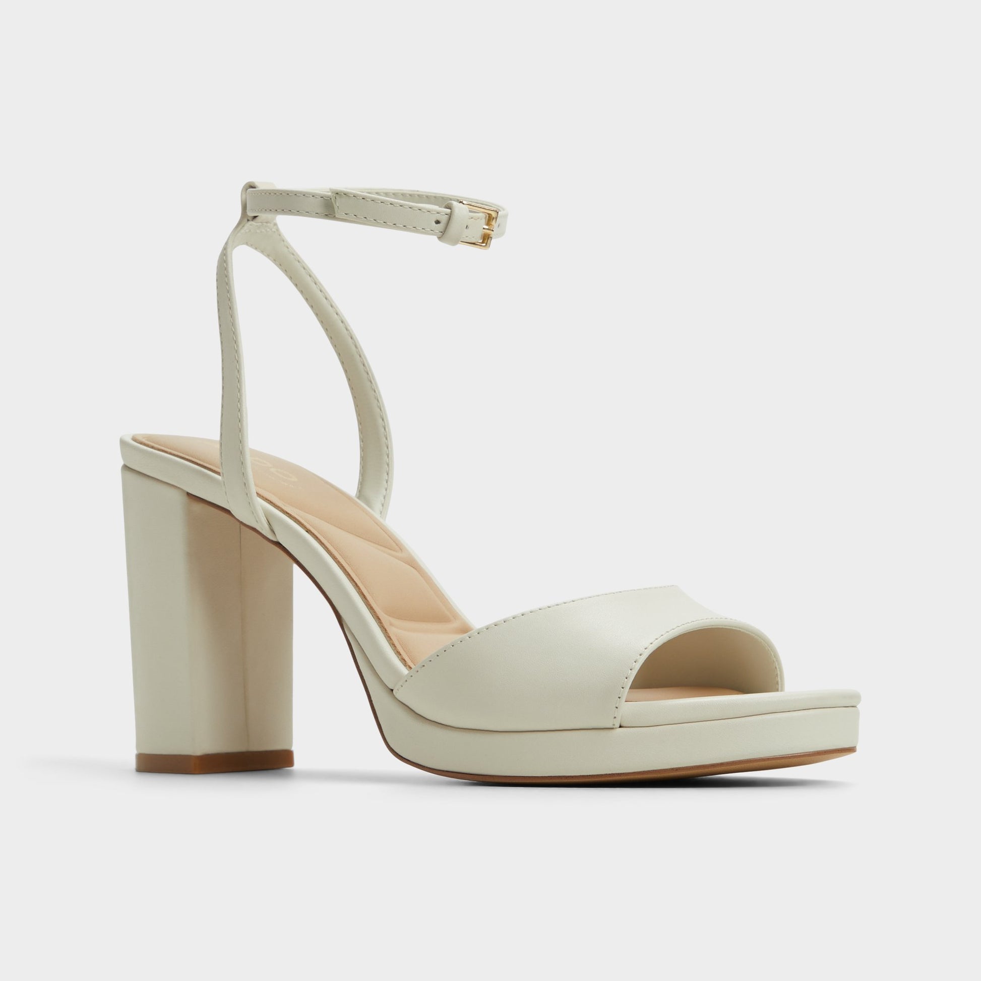 Three-quarter angle of White/Bone Gracious Strappy heeled sandal's front side