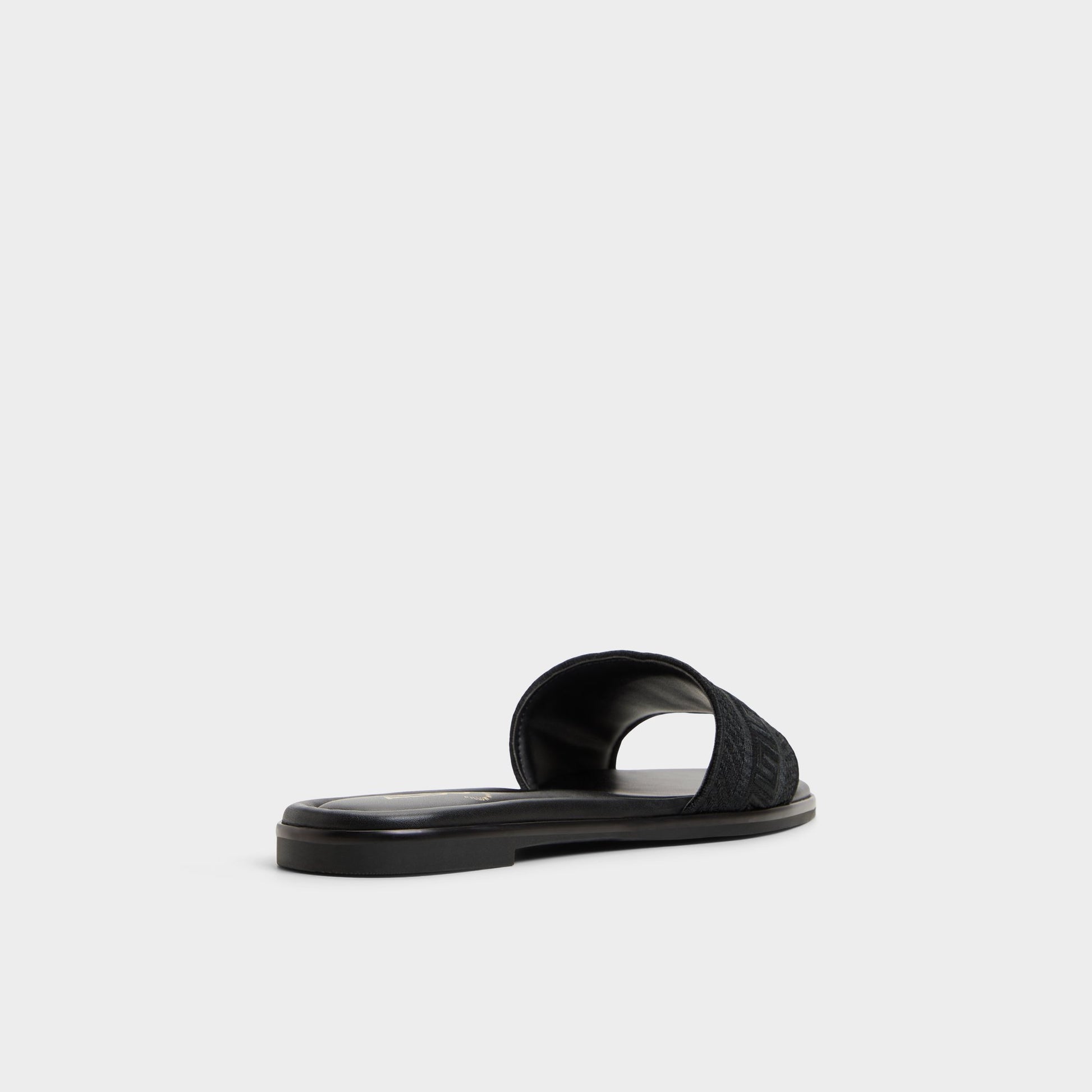 Three-quarter angle of Black Oceania Slide sandal's back side