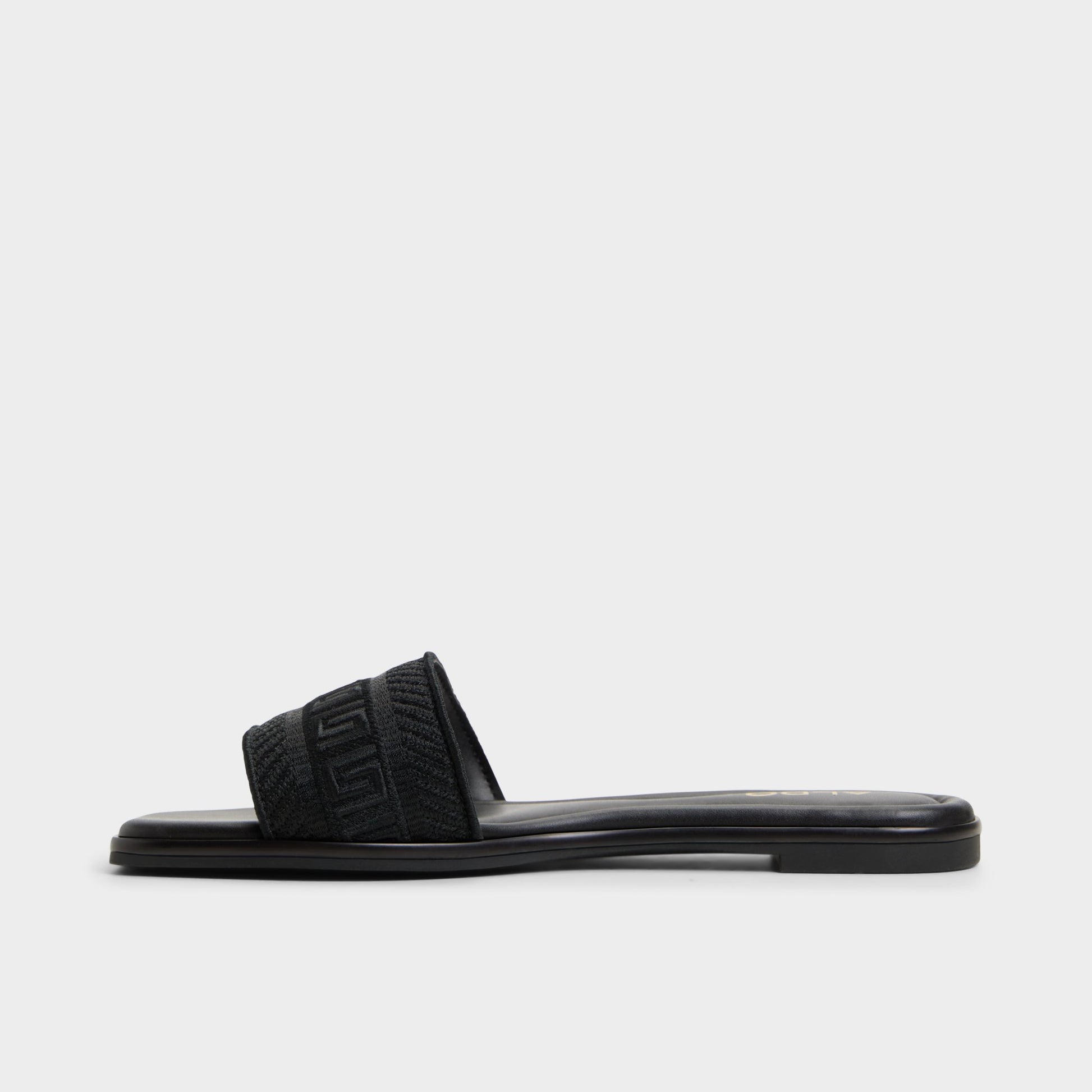 Side view of Black Oceania Slide sandal