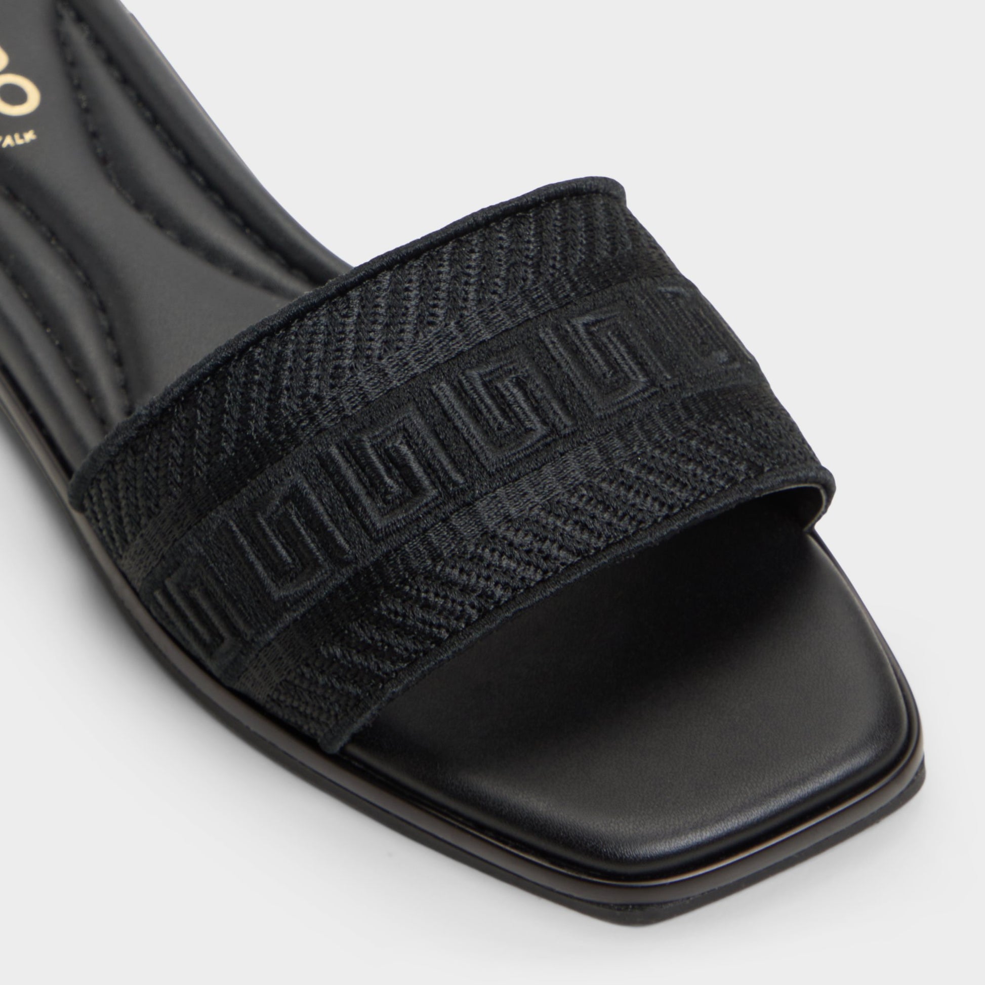 Close-up of the Black Oceania Slide sandal