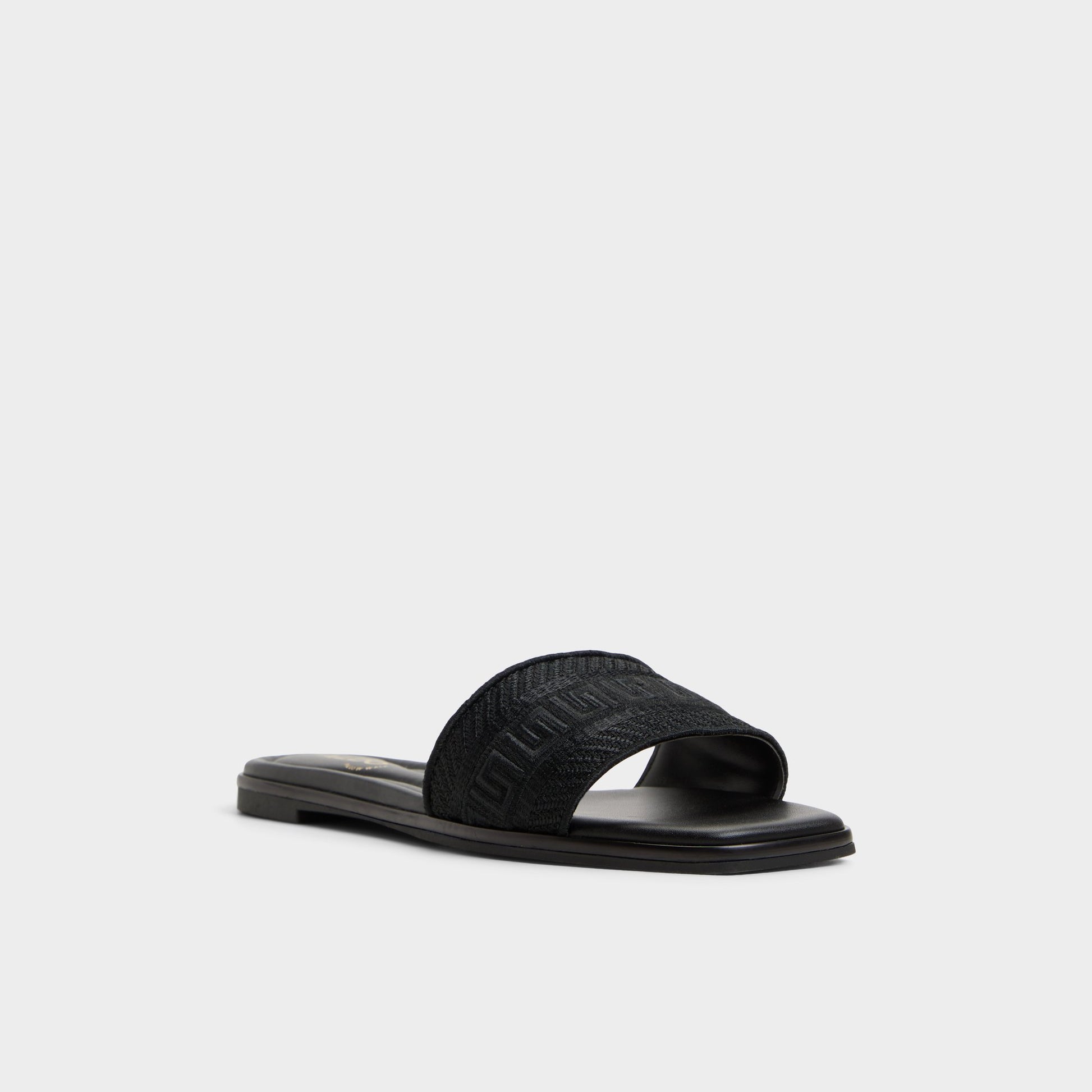 Three-quarter angle of Black Oceania Slide sandal's front side
