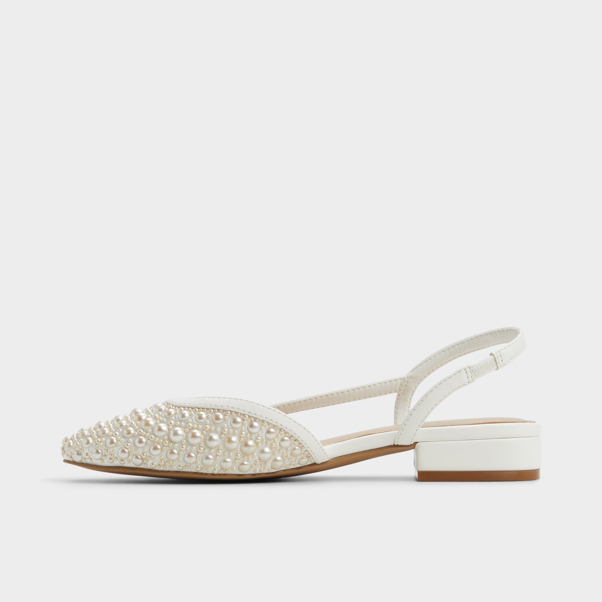 Side view of Other White Constantinne Sling back high heel
