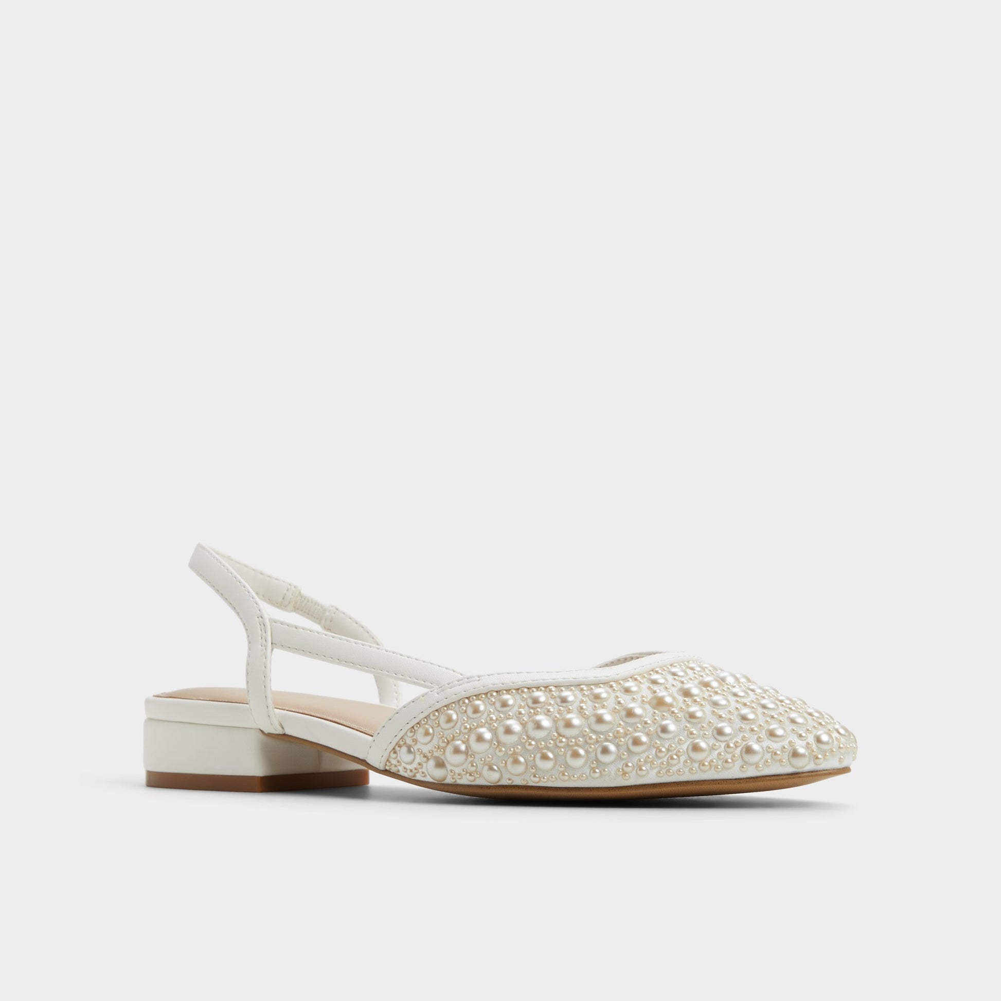 Three-quarter angle of Other White Constantinne Sling back high heel's front side