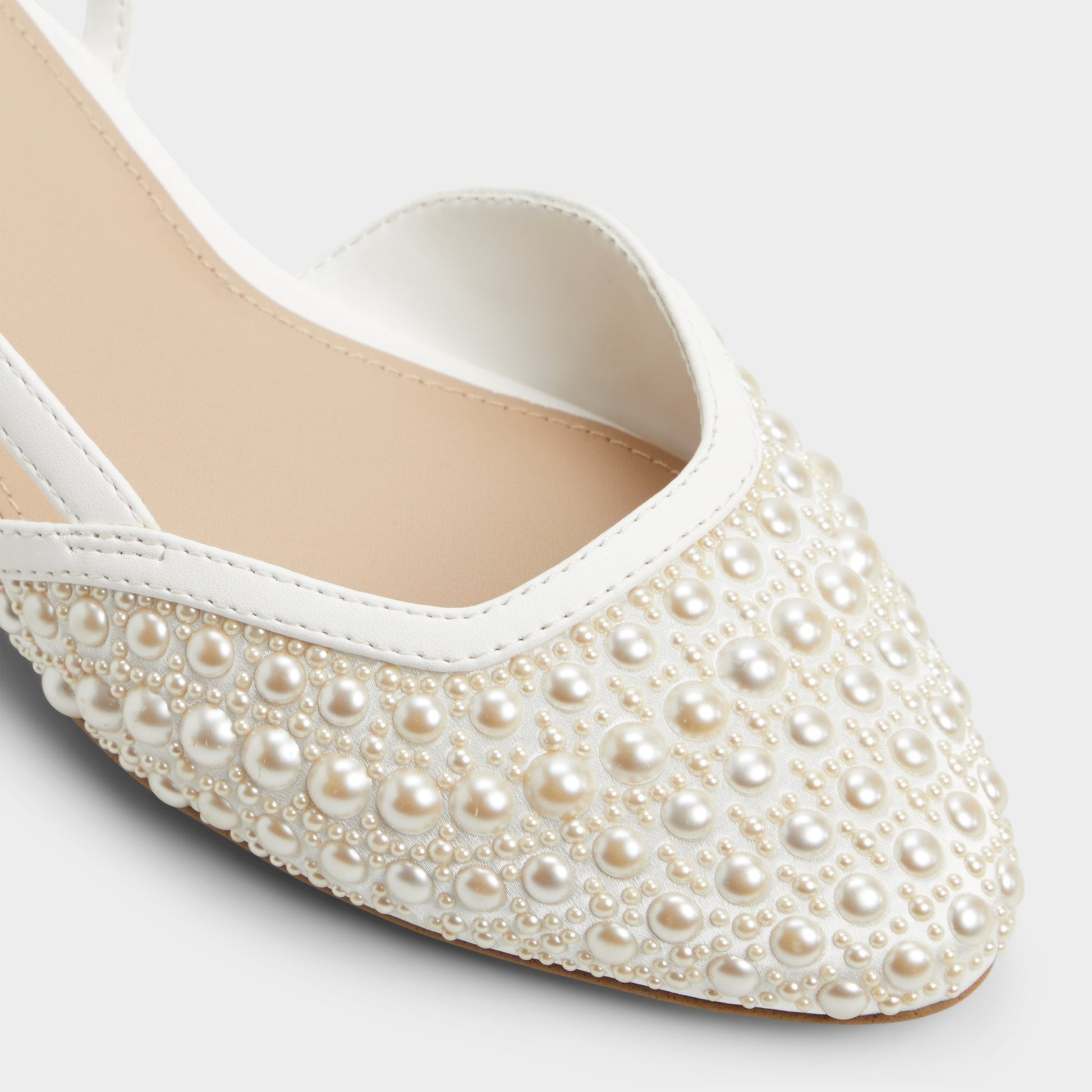 Close-up of the Other White Constantinne Sling back high heel