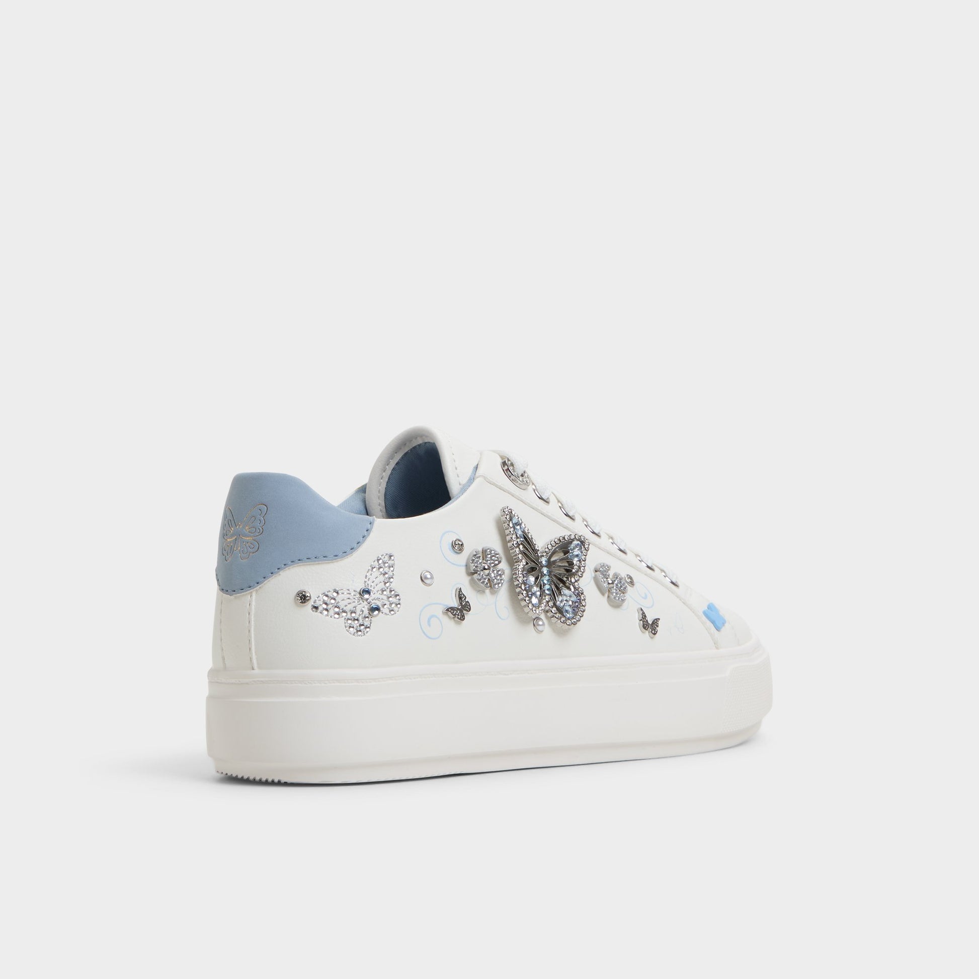 Three-quarter angle of White/Multi Saxony Low top sneaker's back side