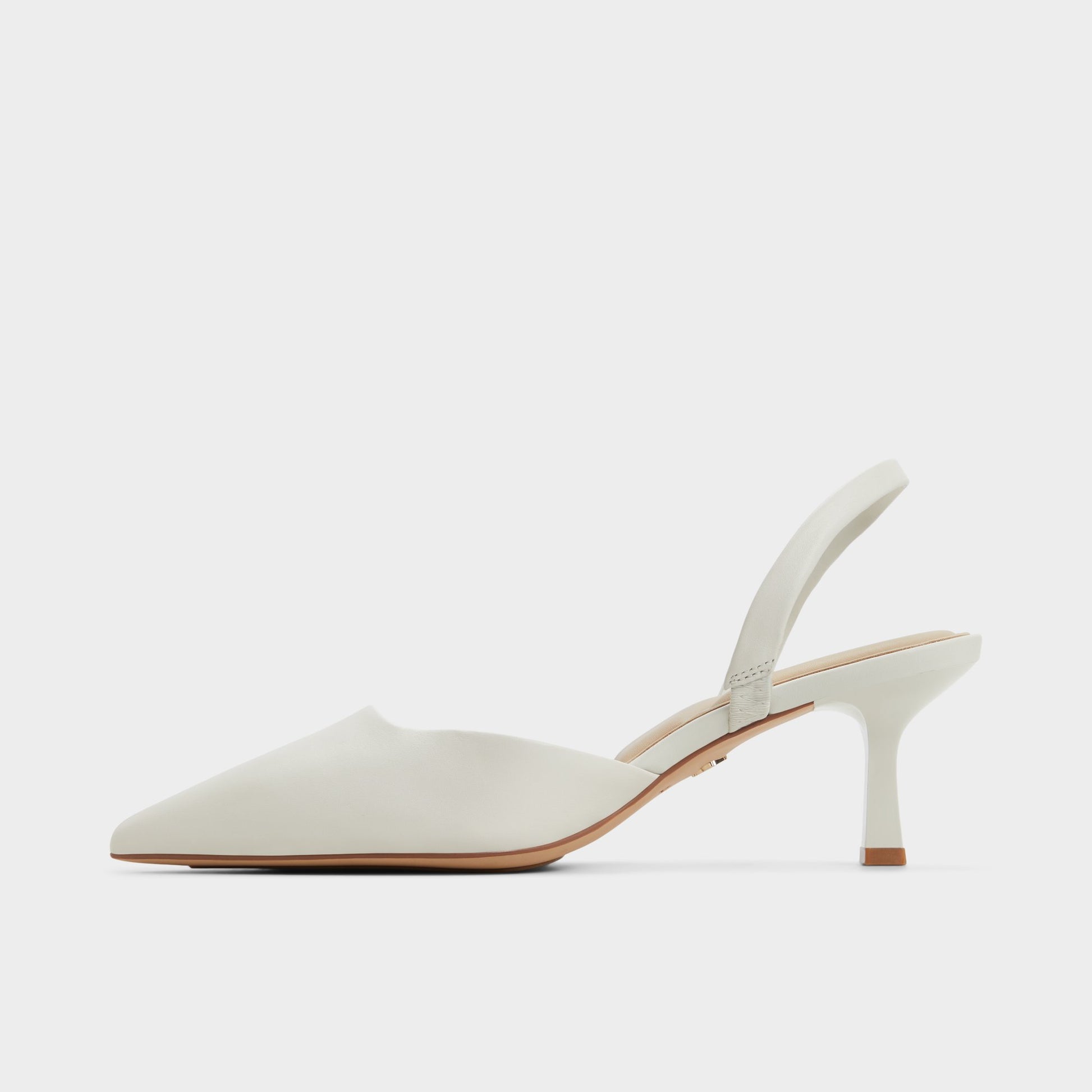 Side view of Open White Gavedessi Slingback heel