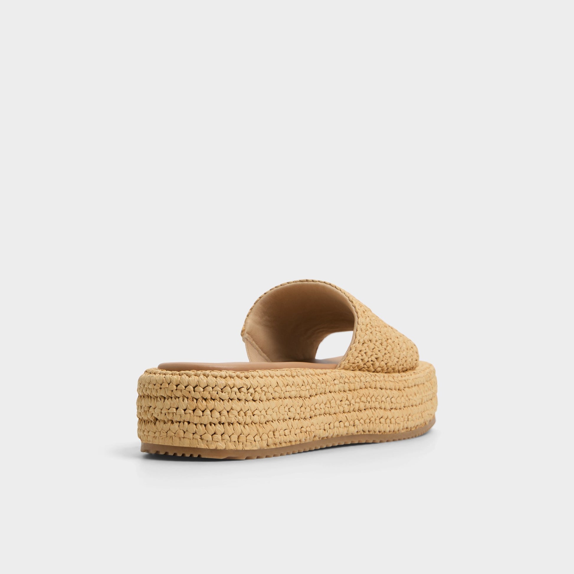 Three-quarter angle of Natural Bohemina Flatform sandal's back side