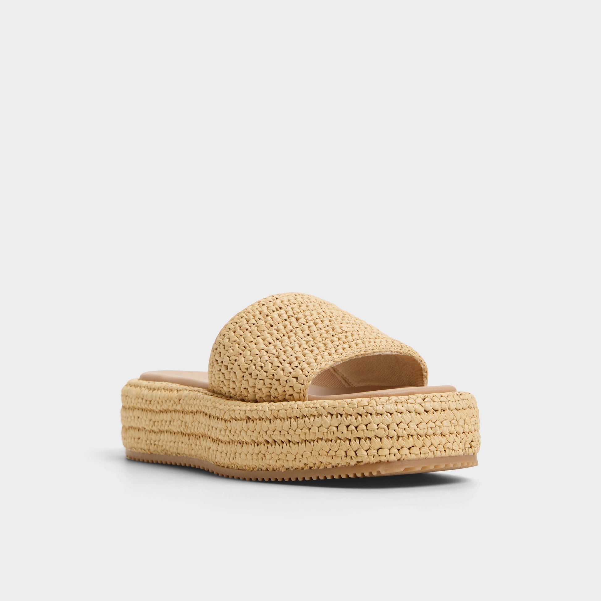 Three-quarter angle of Natural Bohemina Flatform sandal's front side