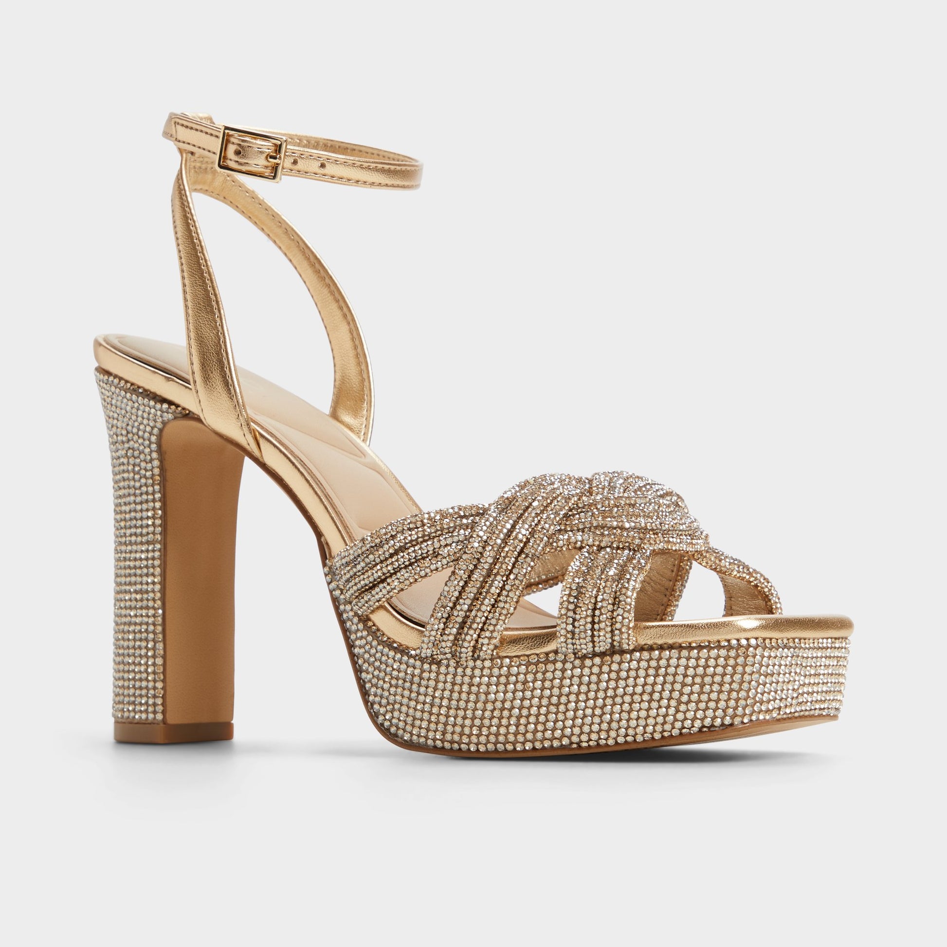 Three-quarter angle of Gold Shimma Strappy heeled sandal's front side