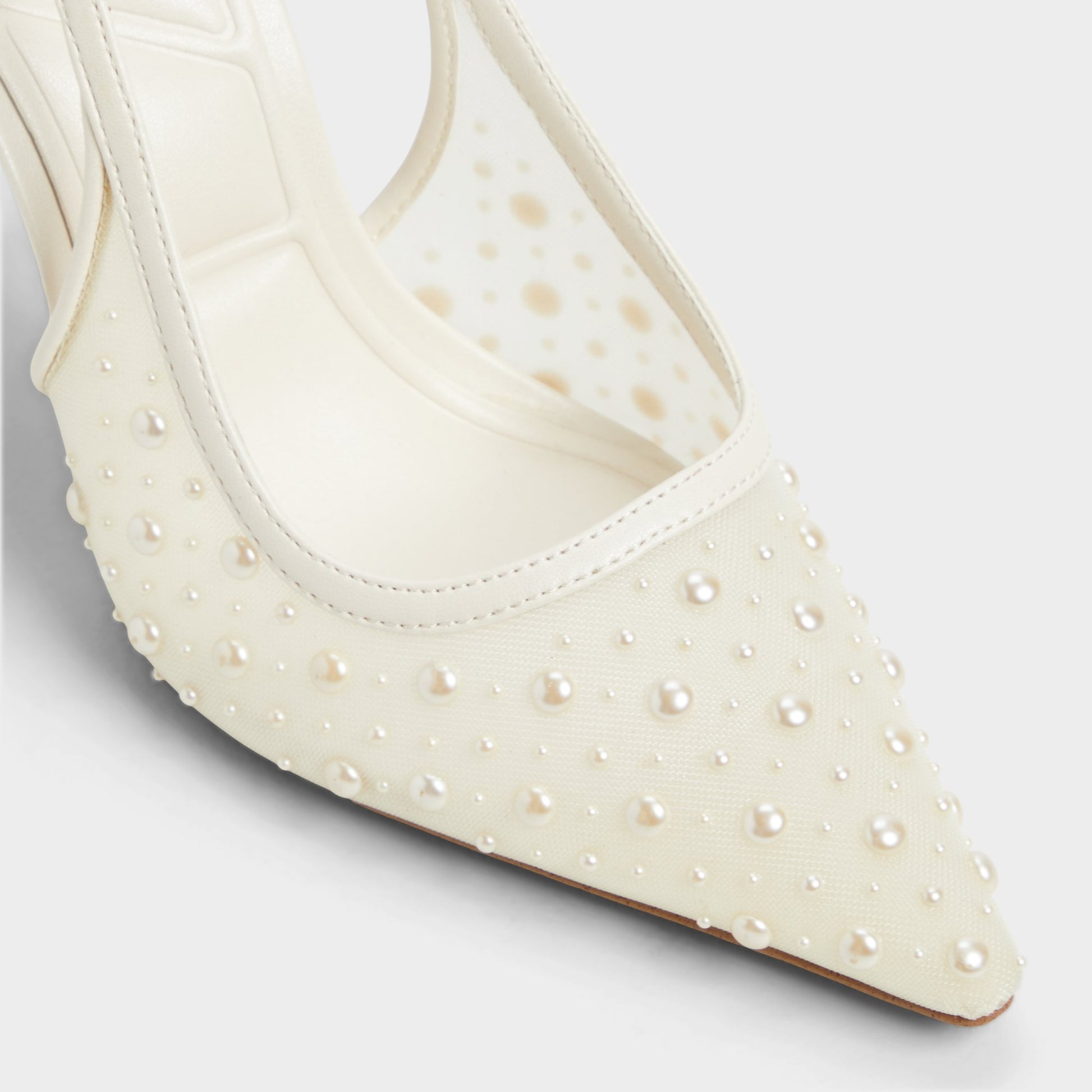 Close-up of the Other White Pearlescent Slingback heel