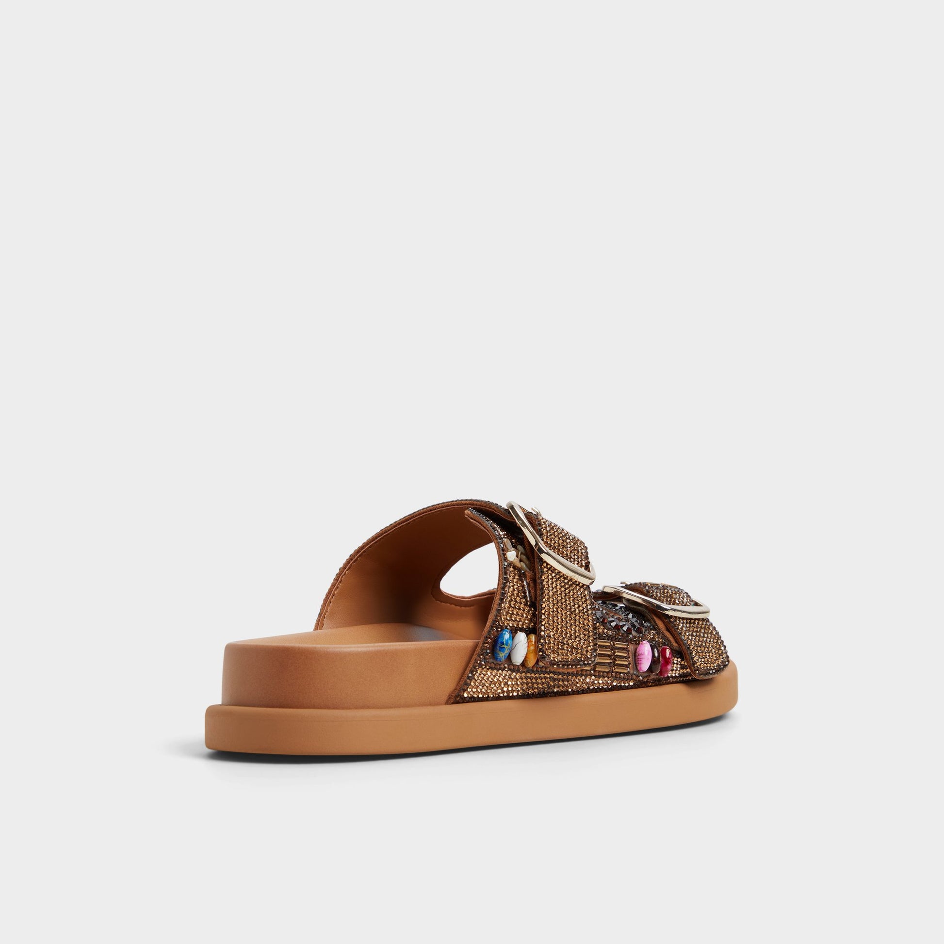 Three-quarter angle of Open Brown Bohochic Footbed sandal's back side