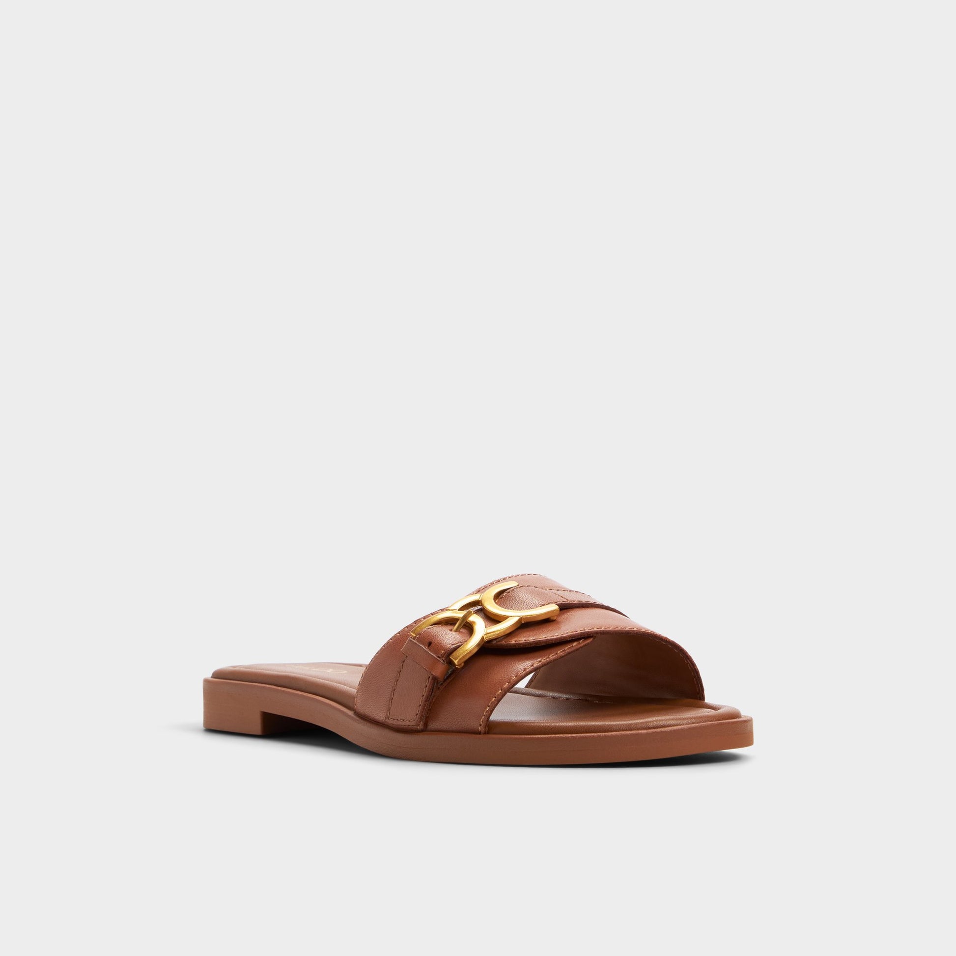 Three-quarter angle of Medium Brown Dallaedar Slide sandal's front side