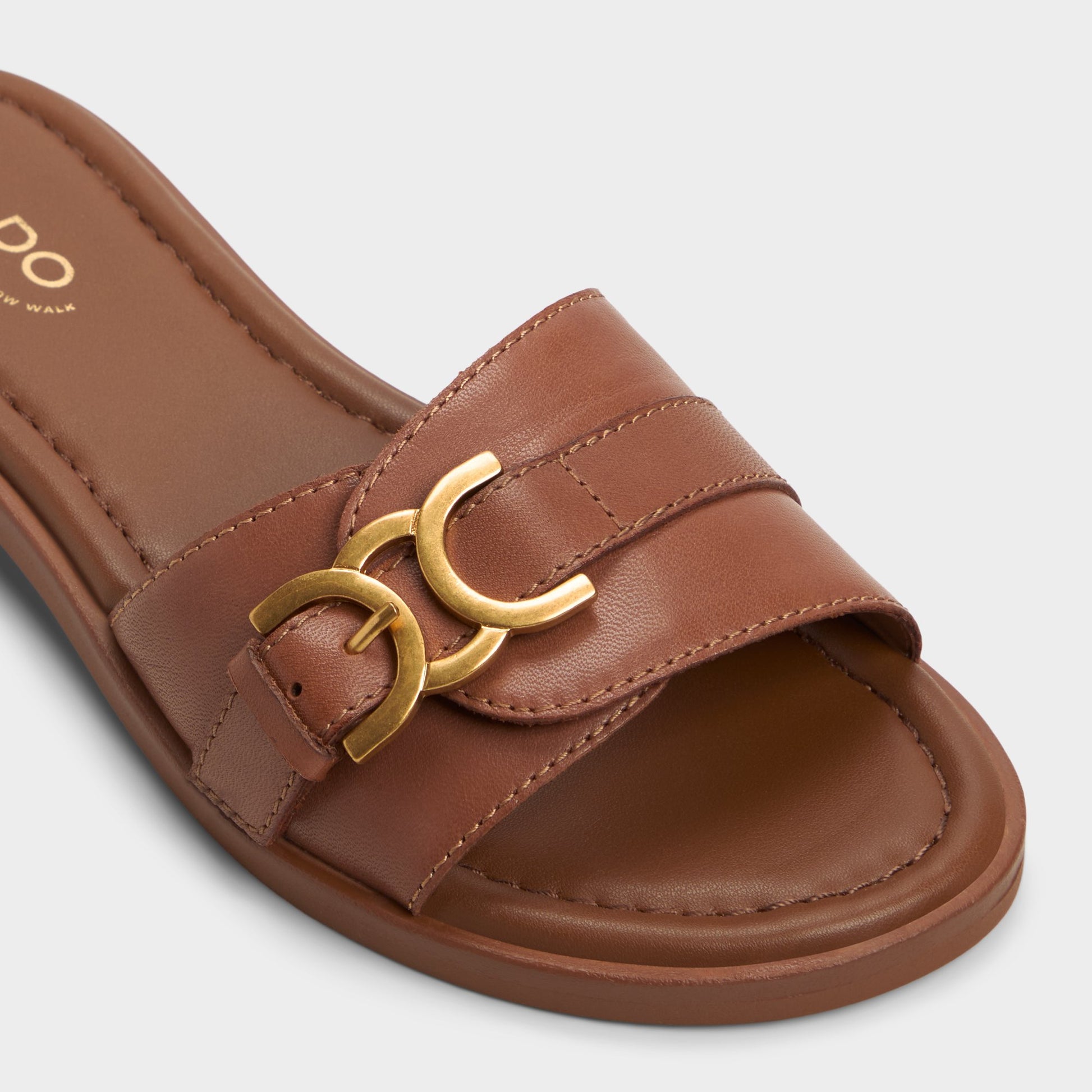 Close-up of the Medium Brown Dallaedar Slide sandal