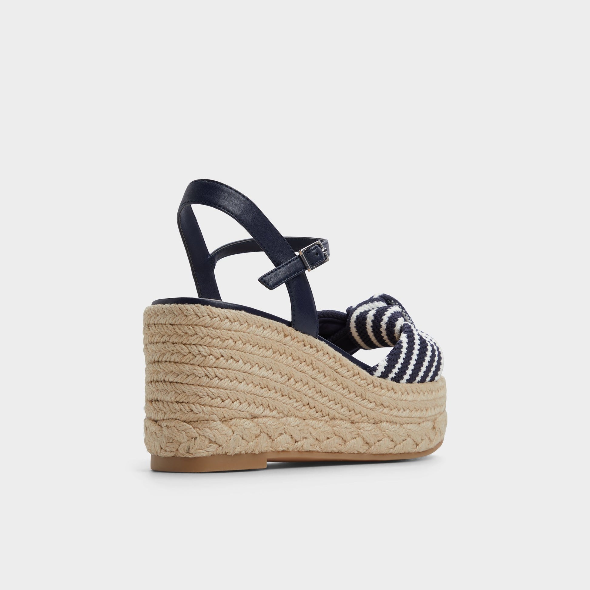 Three-quarter angle of Navy Annamarie Wedge sandal's back side