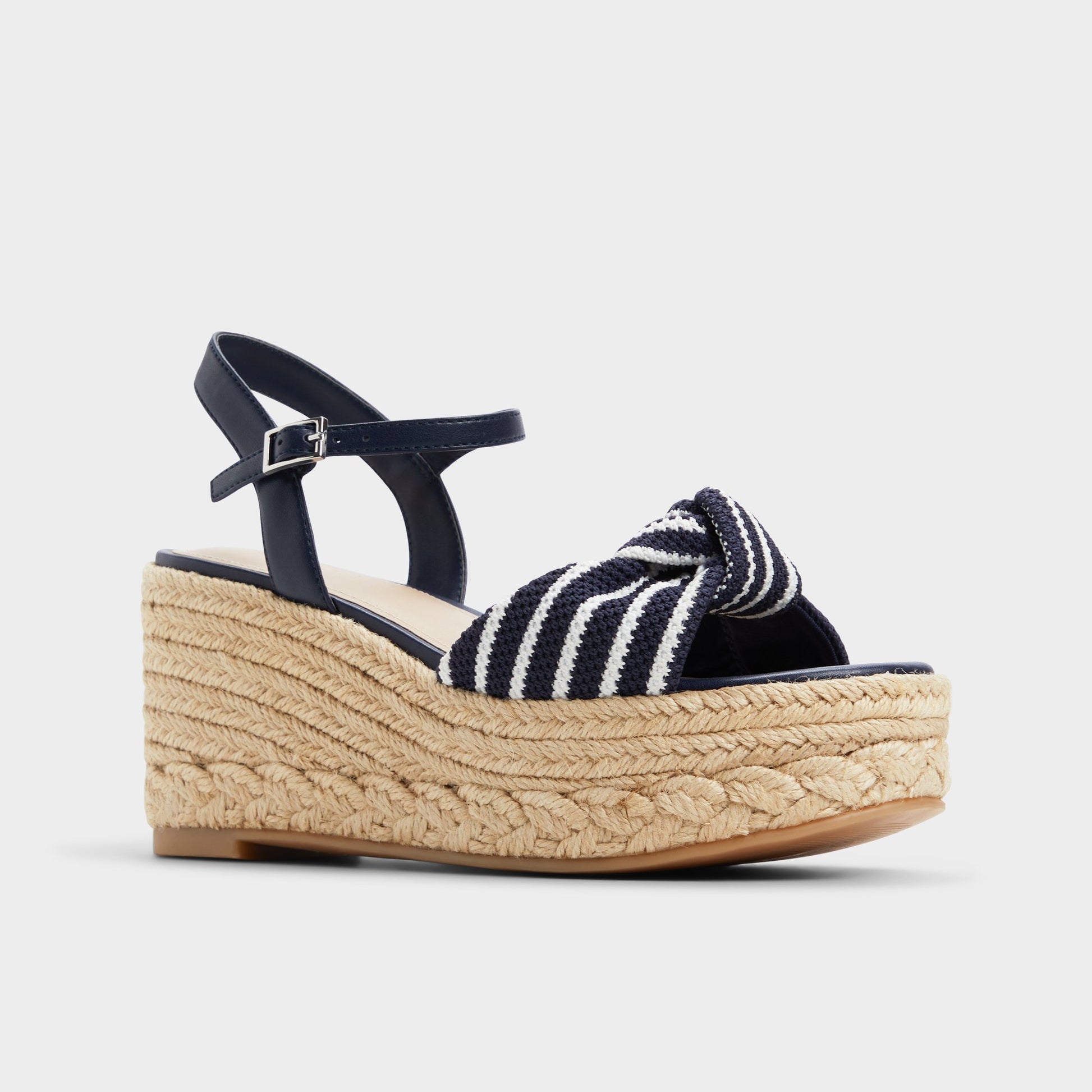 Three-quarter angle of Navy Annamarie Wedge sandal's front side
