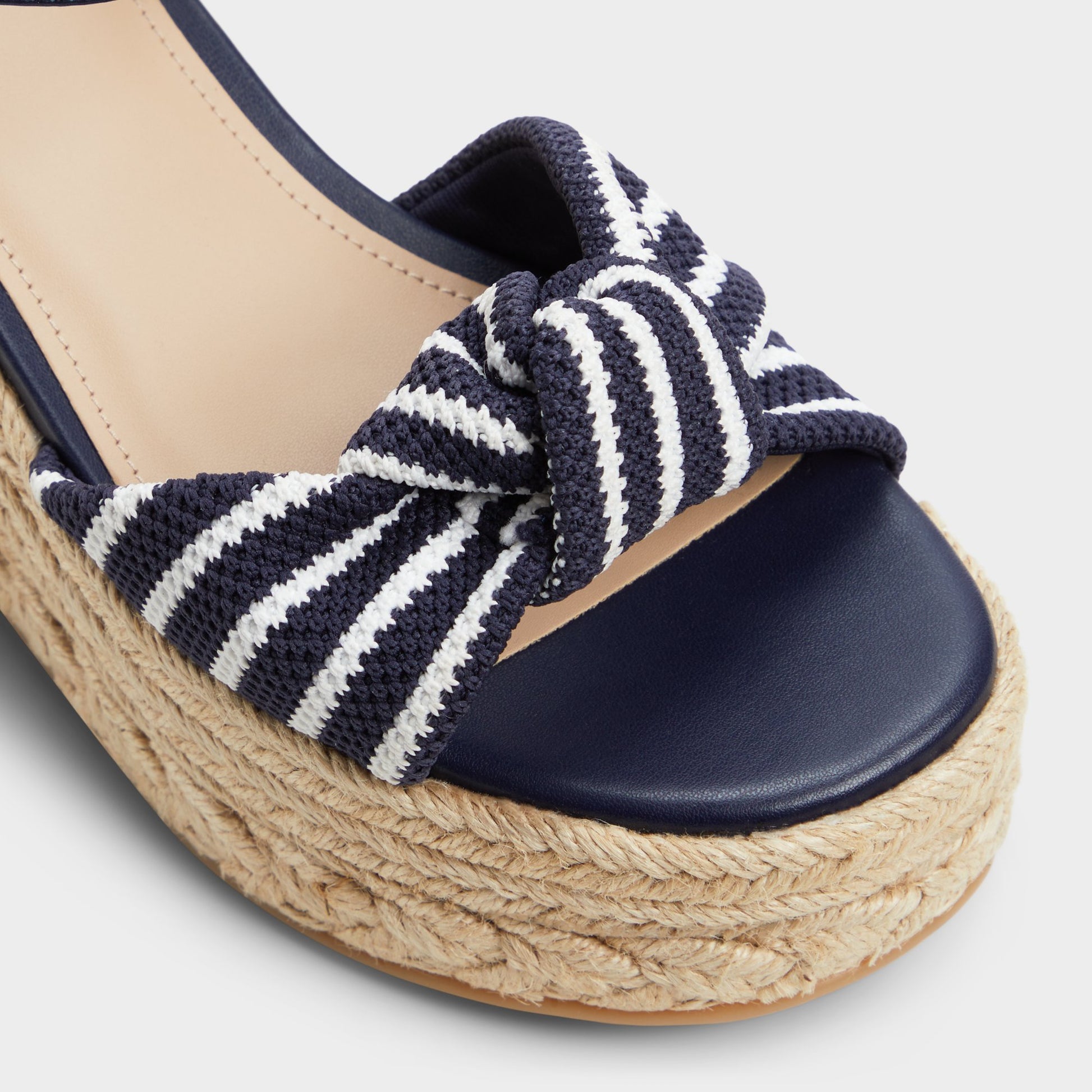 Close-up of the Navy Annamarie Wedge sandal