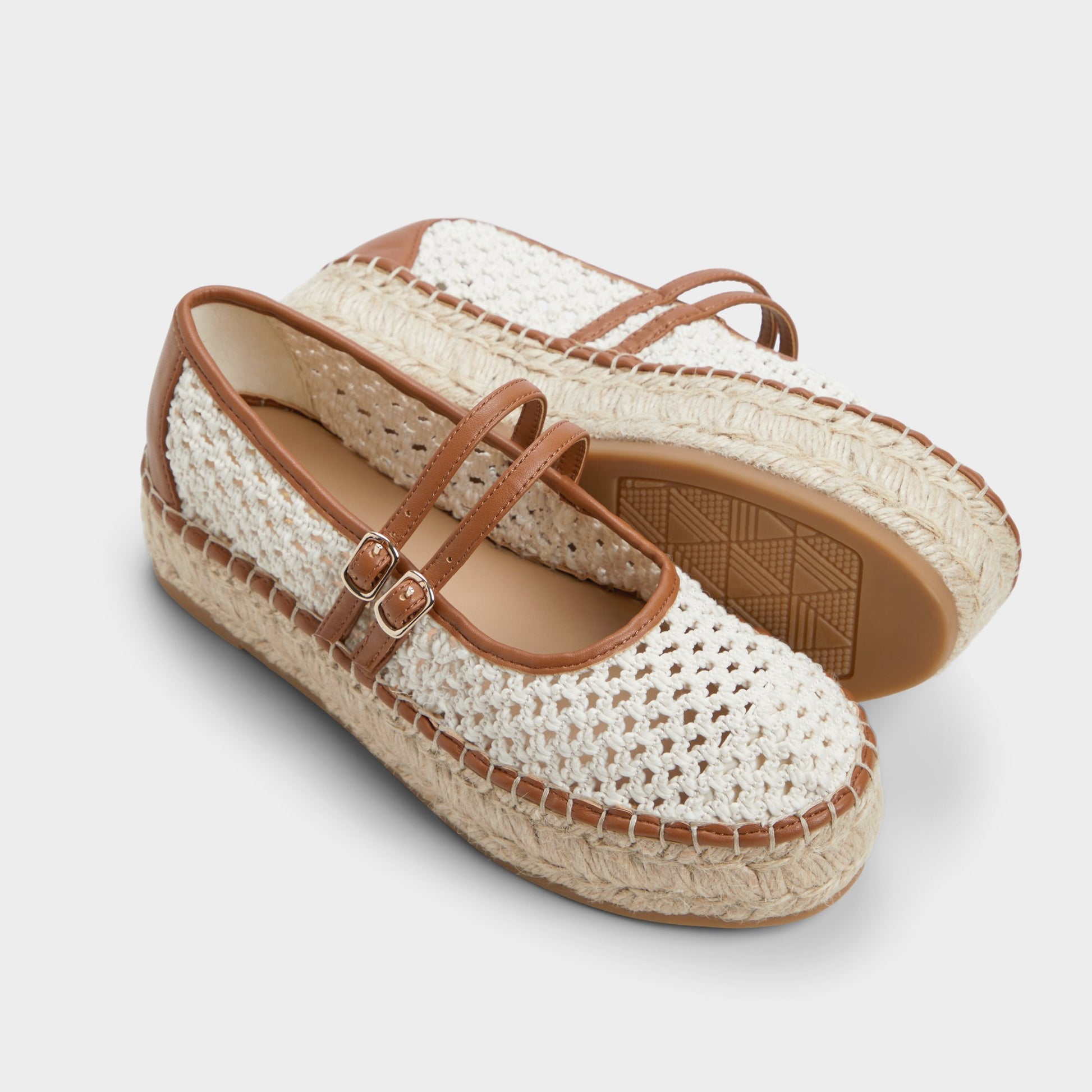 Highlighted view of a pair of White/Bone Summerfling Espadrilless