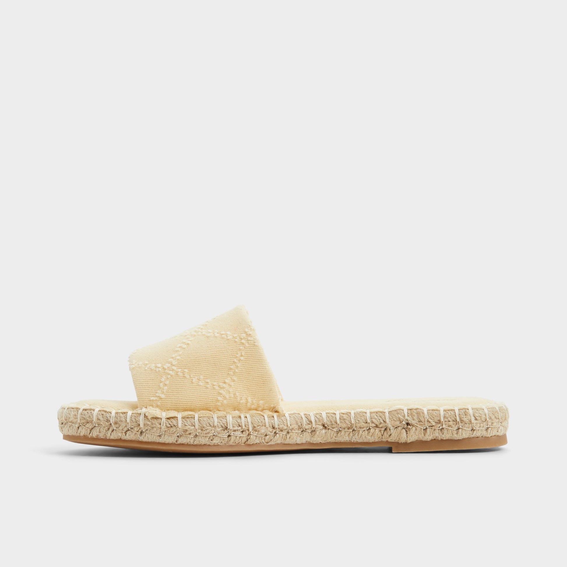 Side view of Dark Yellow Erireni Slide sandal