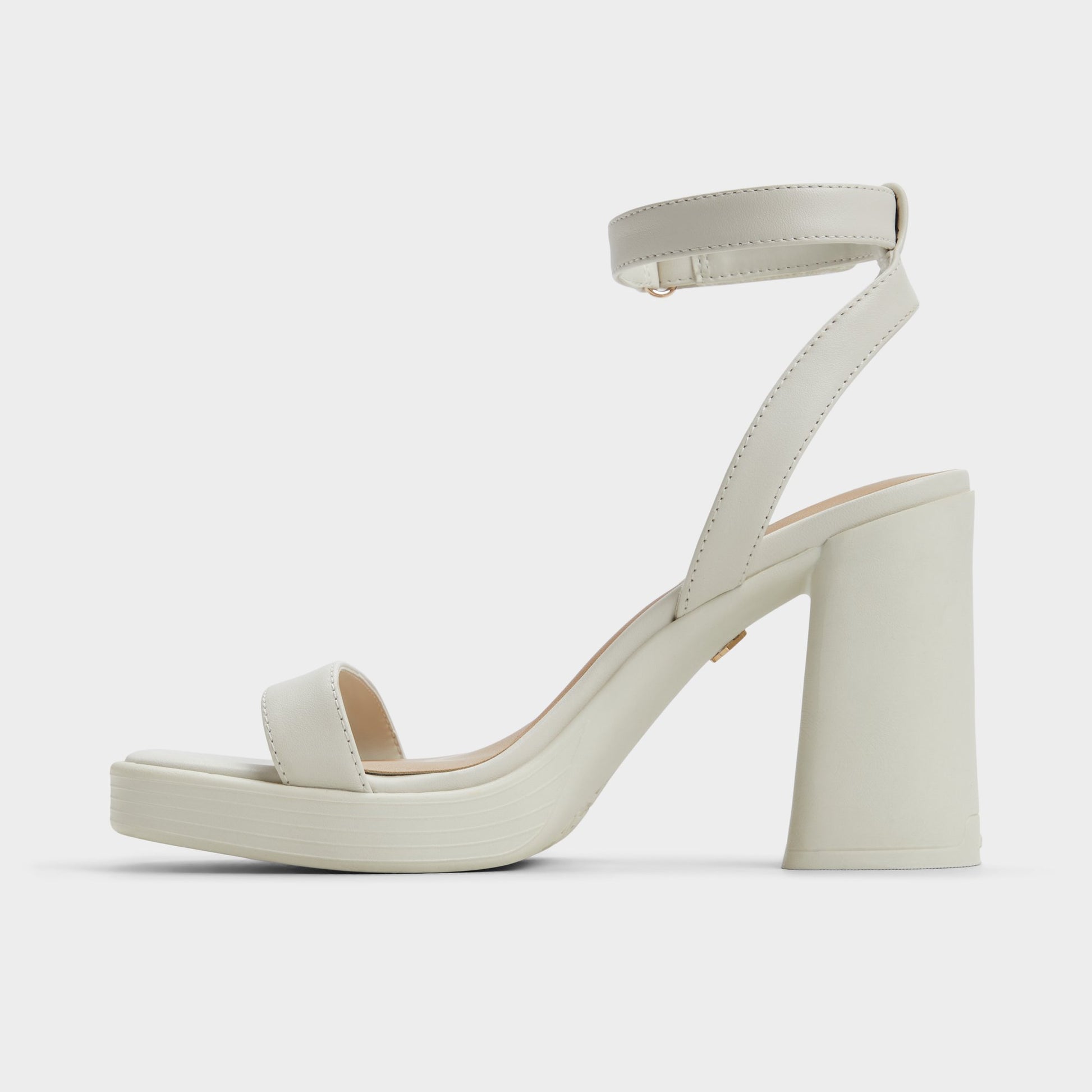 Side view of White/Bone Berade Strappy heeled sandal